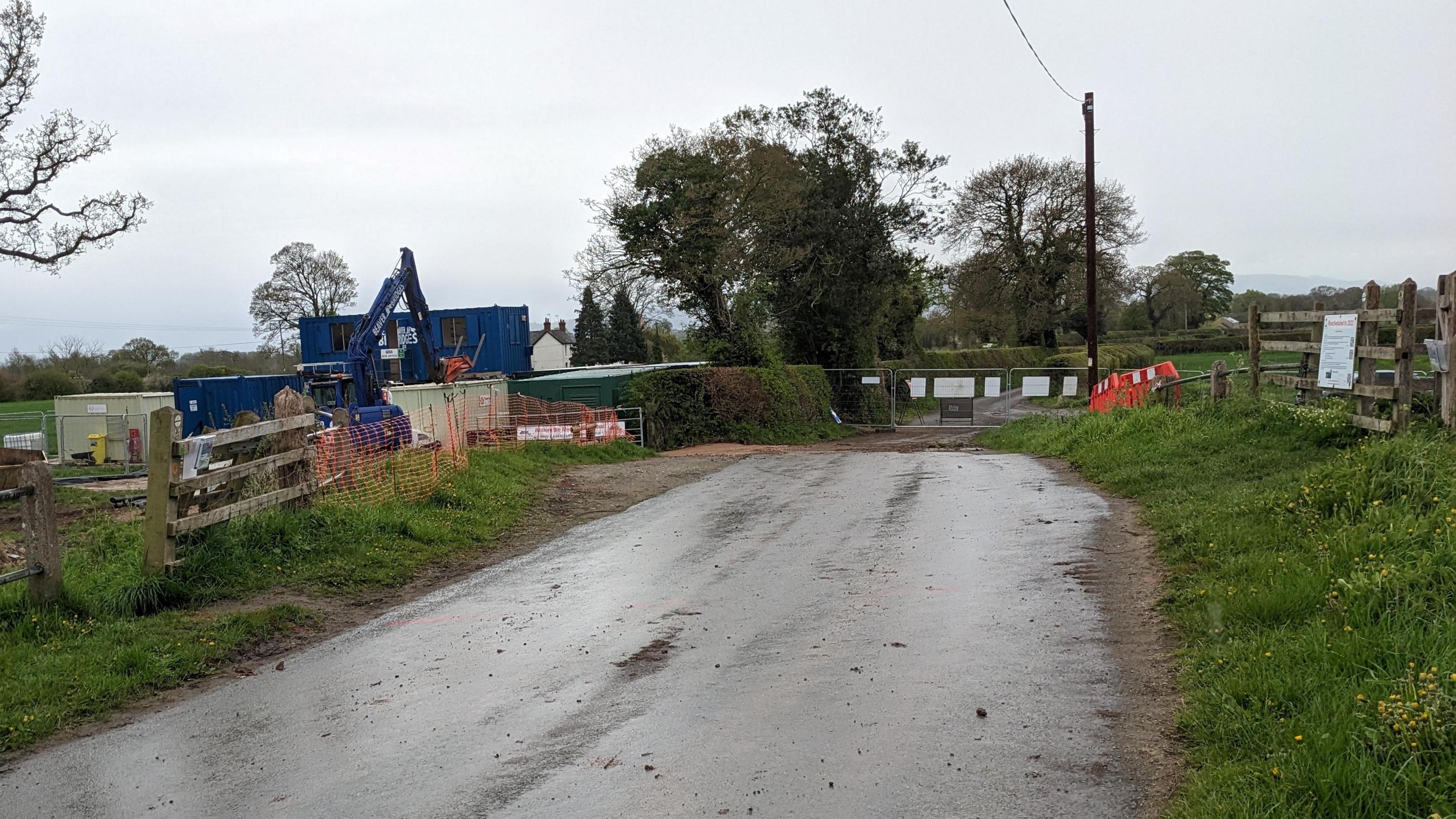 Section of road fenced off