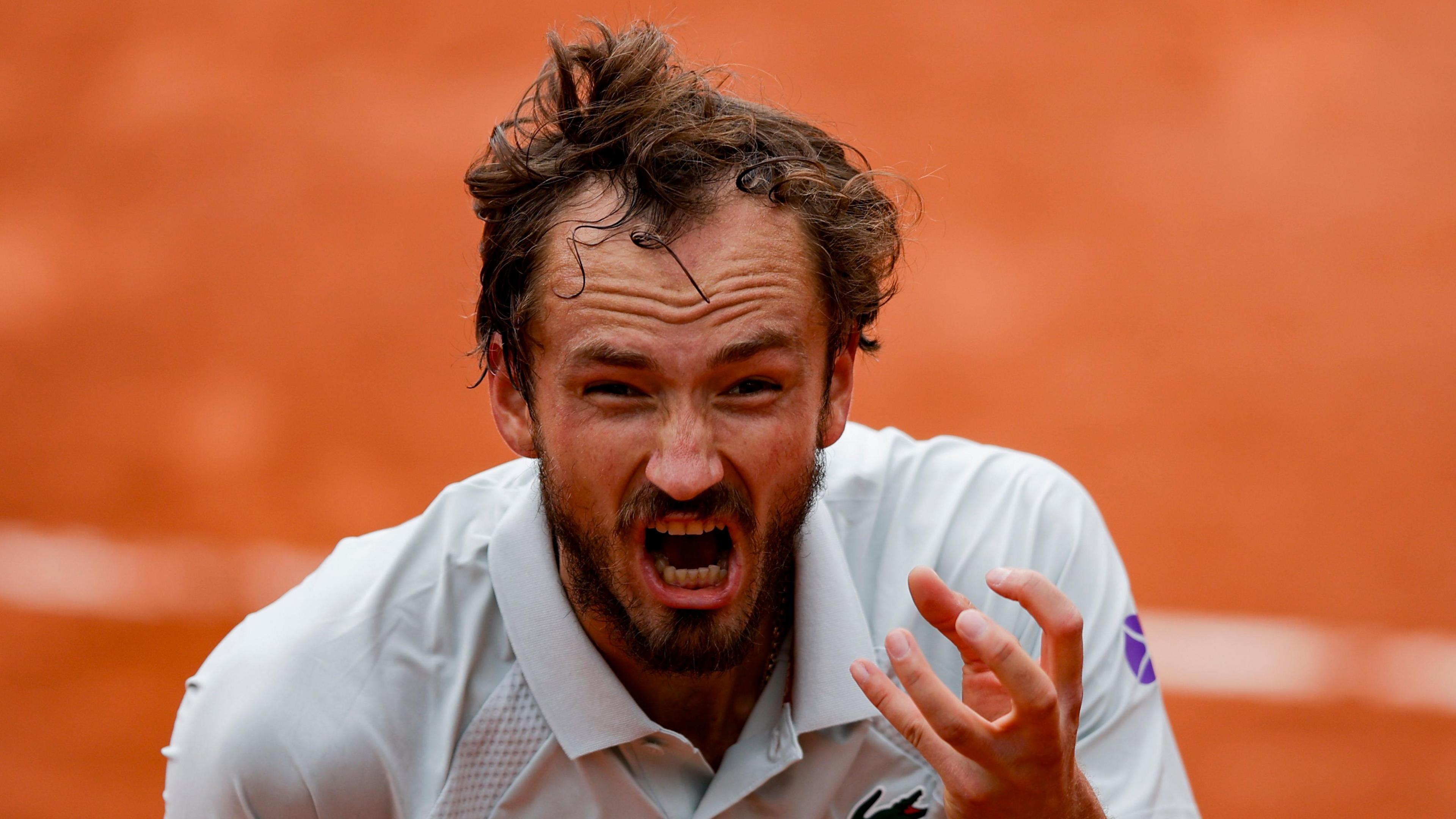 Daniil Medvedev reacts during his French Open defeat
