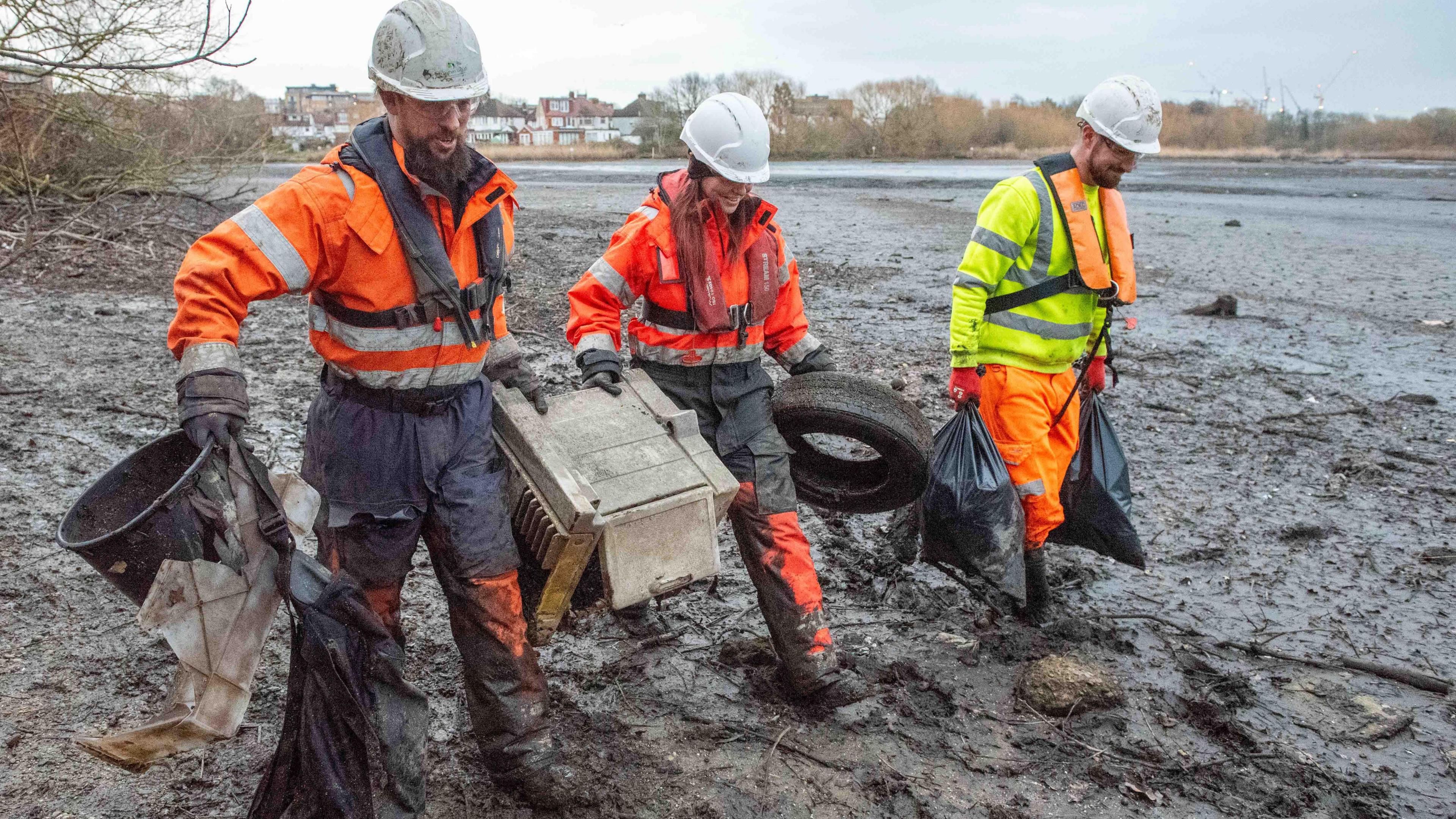 Workers collect rubbish