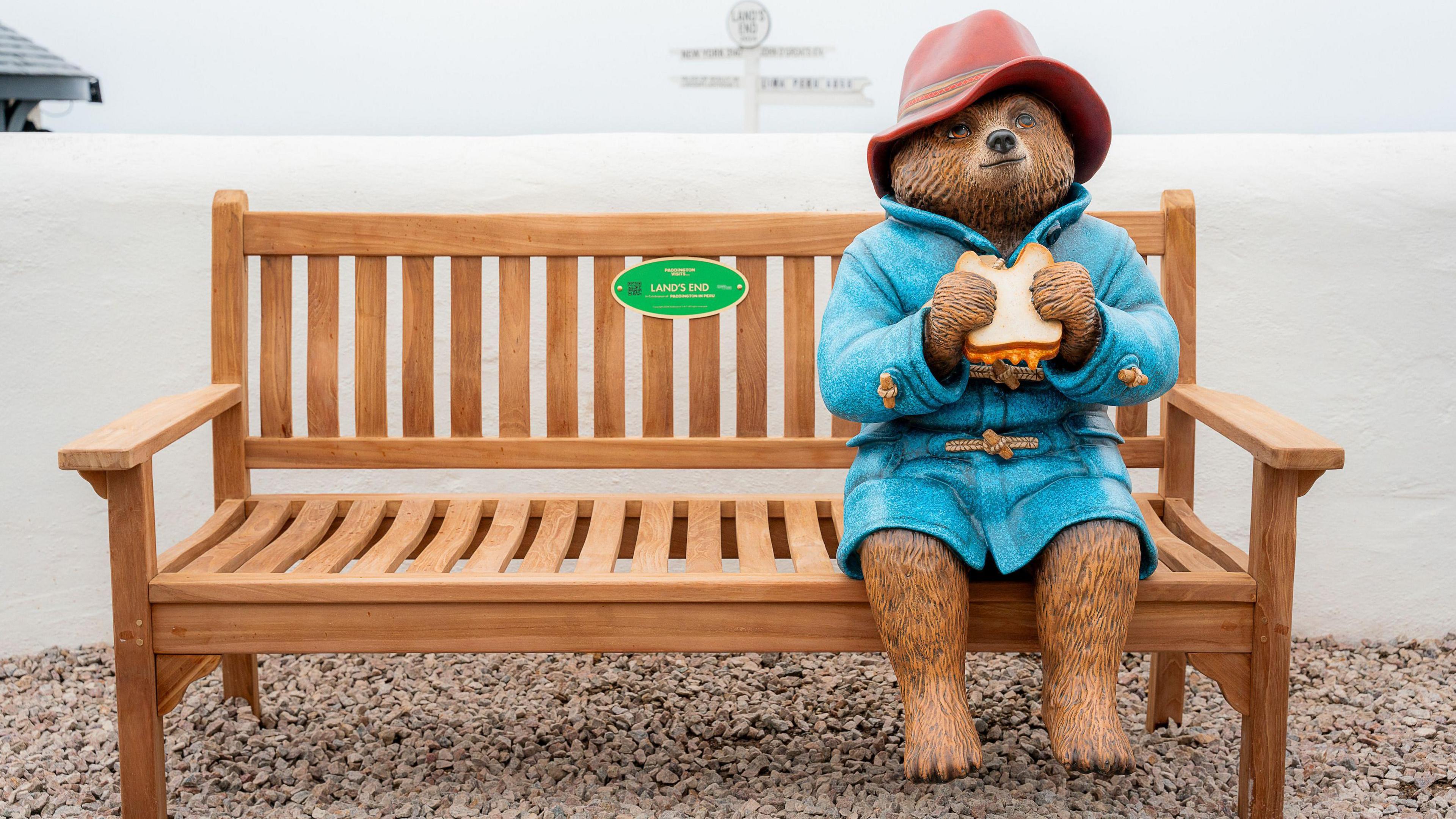 Paddington statue on a bench at Land's End.