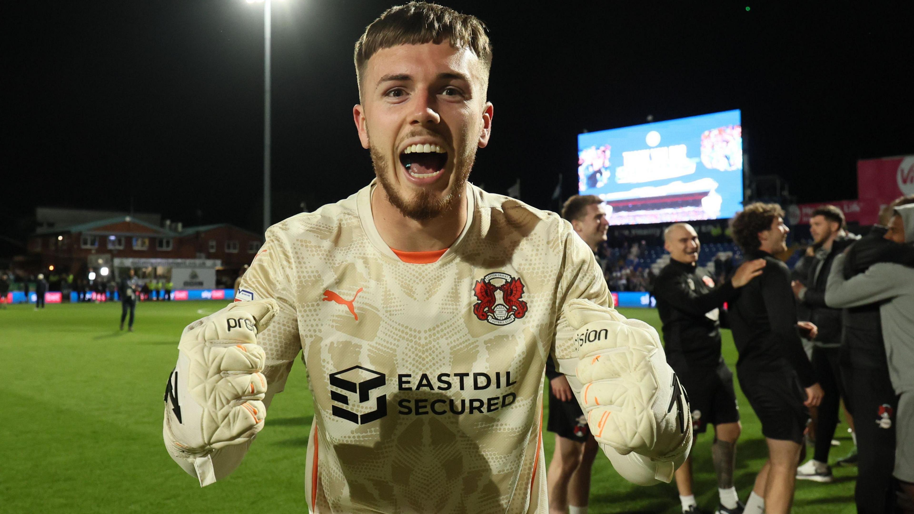 Leyton Orient goalkeeper Josh Keeley celebrates the win over Stockport