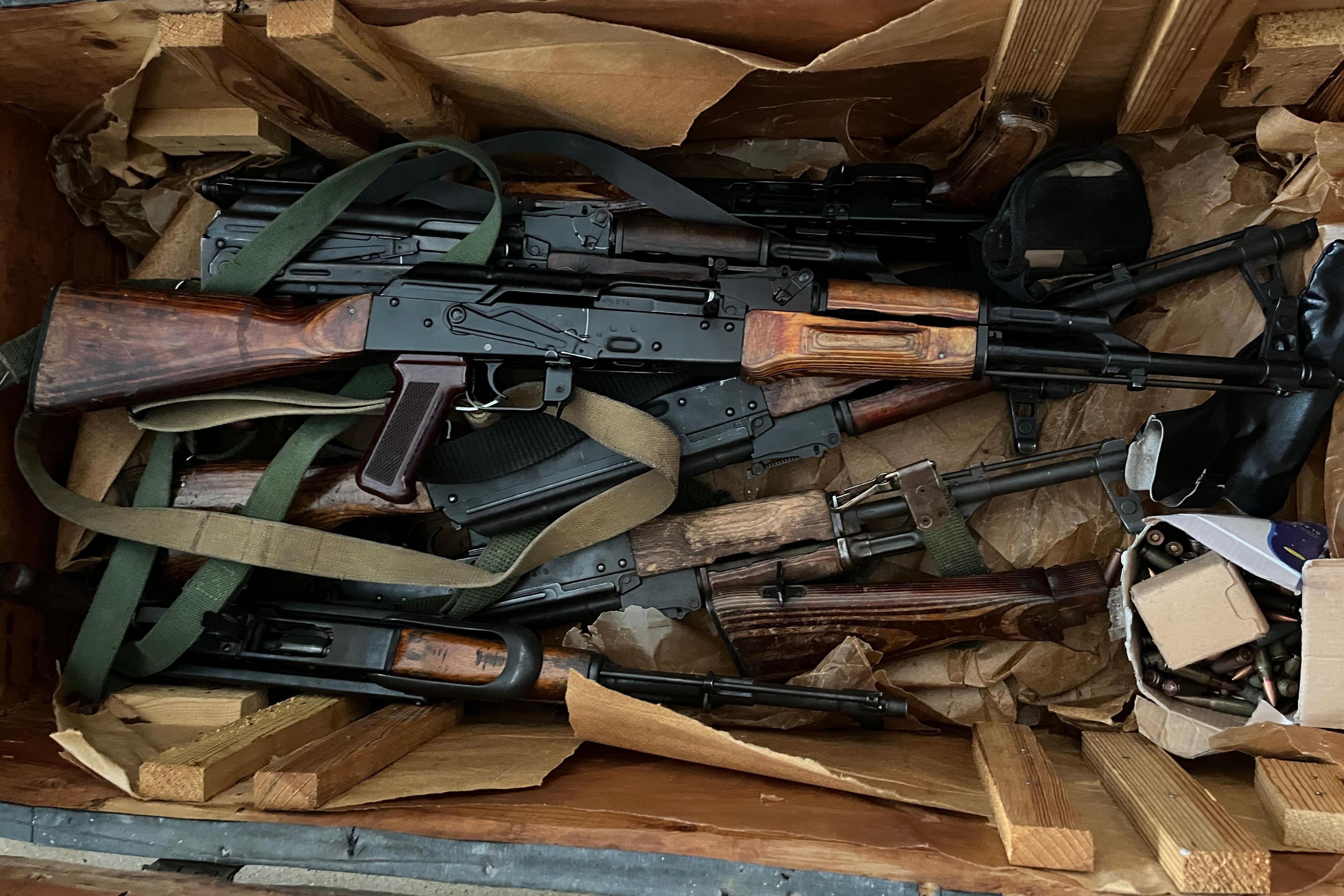 Guns in a wooden crate