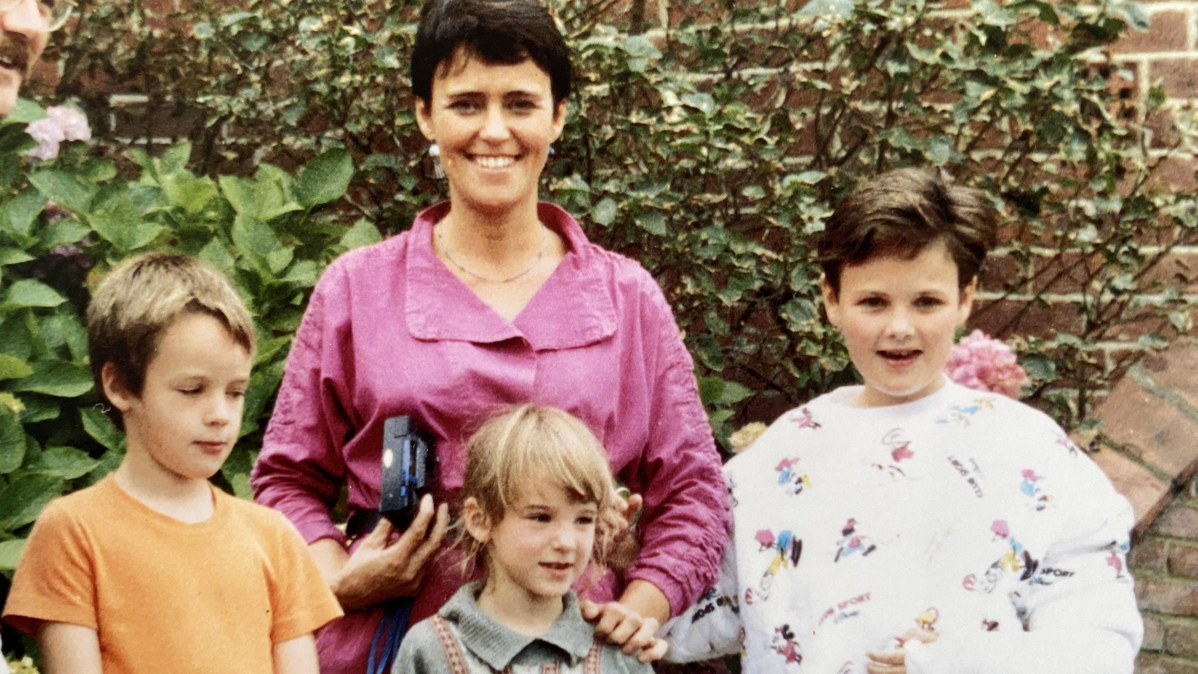 A picture of the family as children with Dan to the left. 