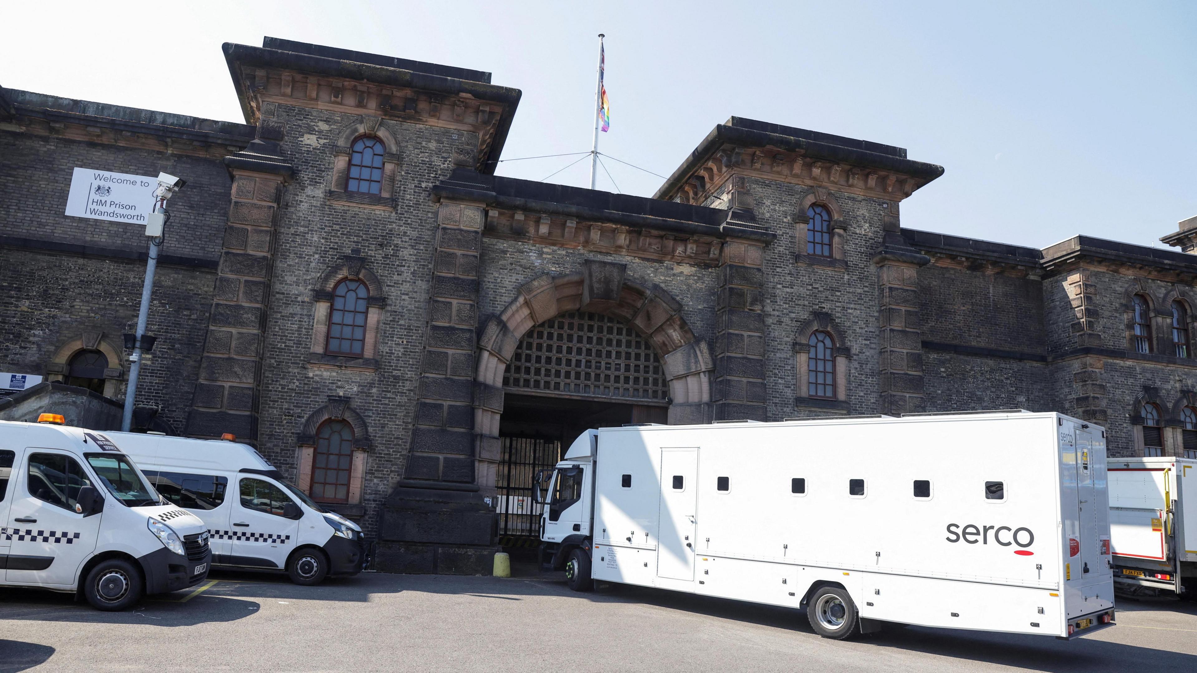 An image of a Serco-branded vehicle driving into Wandsworth prison. 