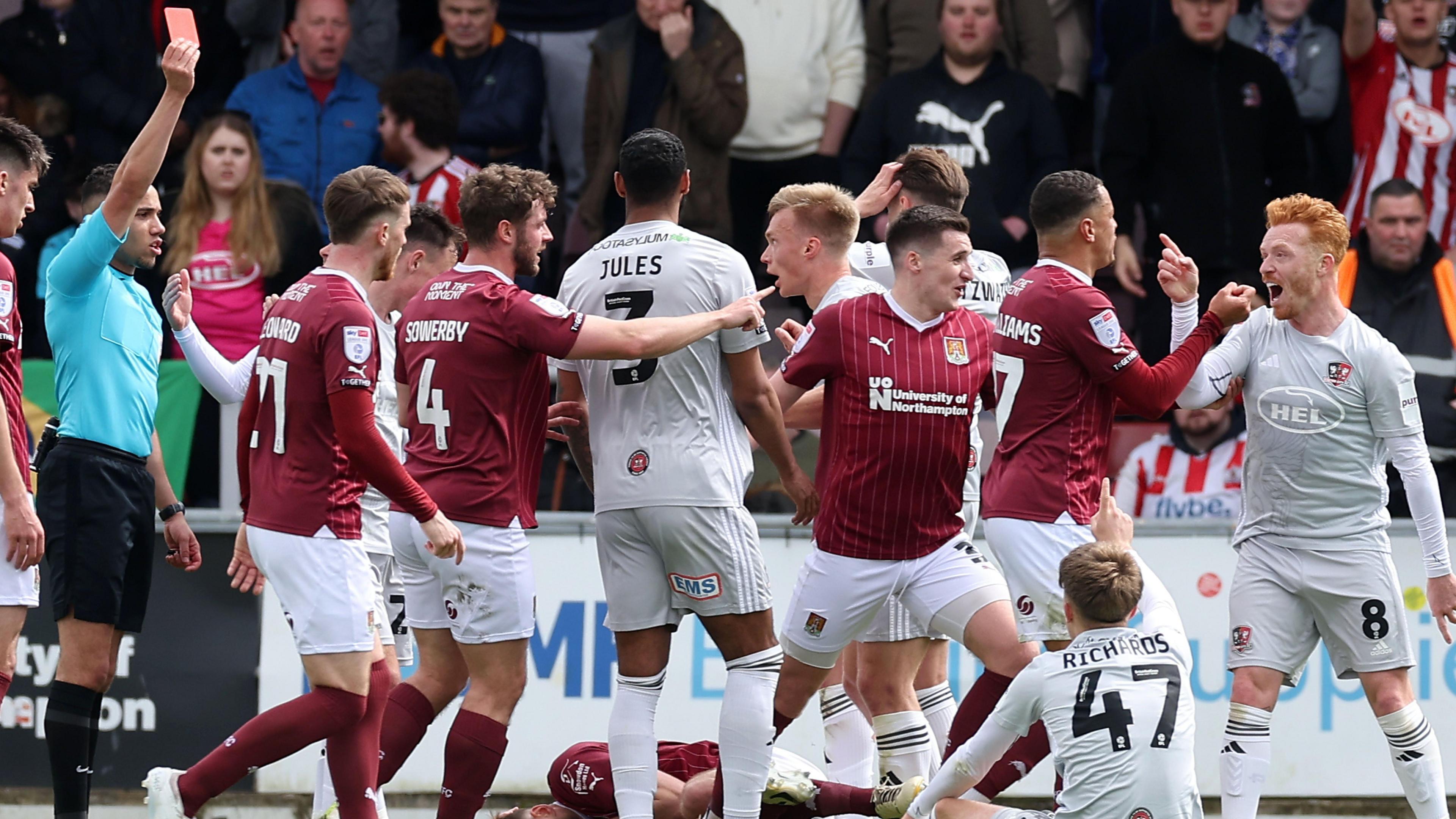 Ryan Woods (right) is sent off shortly before half time