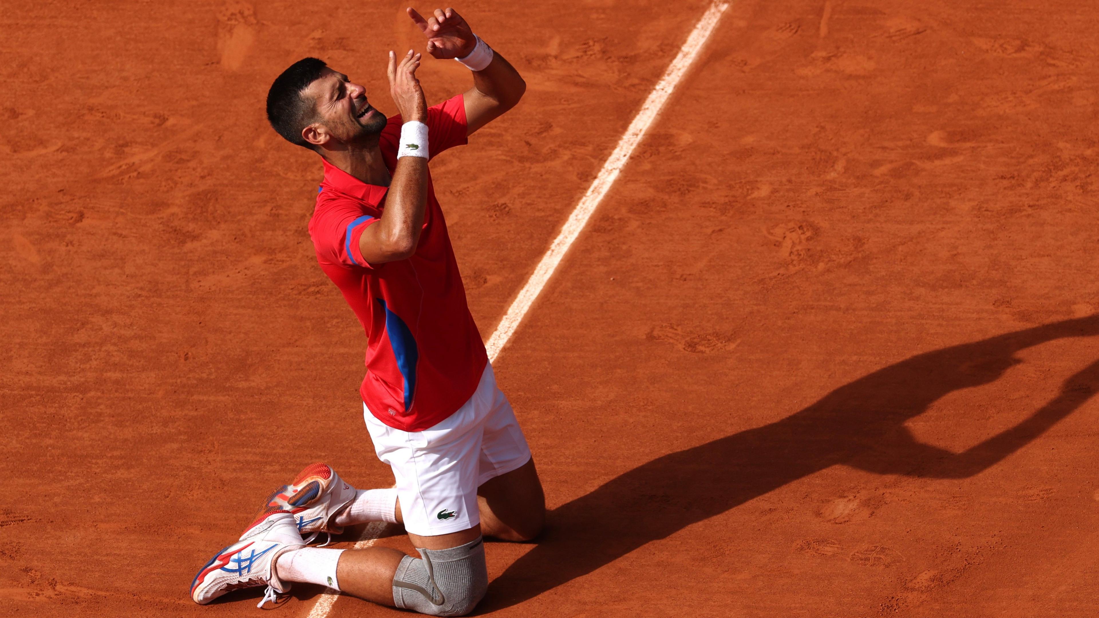 Novak Djokovic falls to his knees in celebration