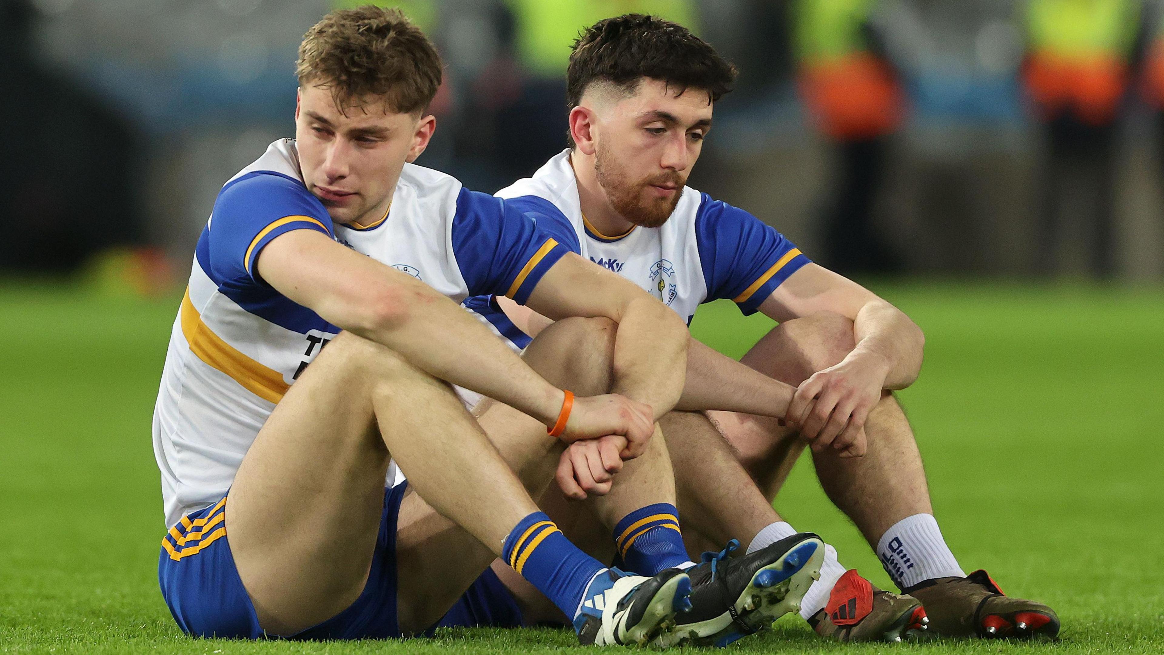 Errigal Ciaran duo Odhran Robinson and Joe Oguz show their disappointment after the Tyrone club's All-Ireland Senior Club Football Final defeat