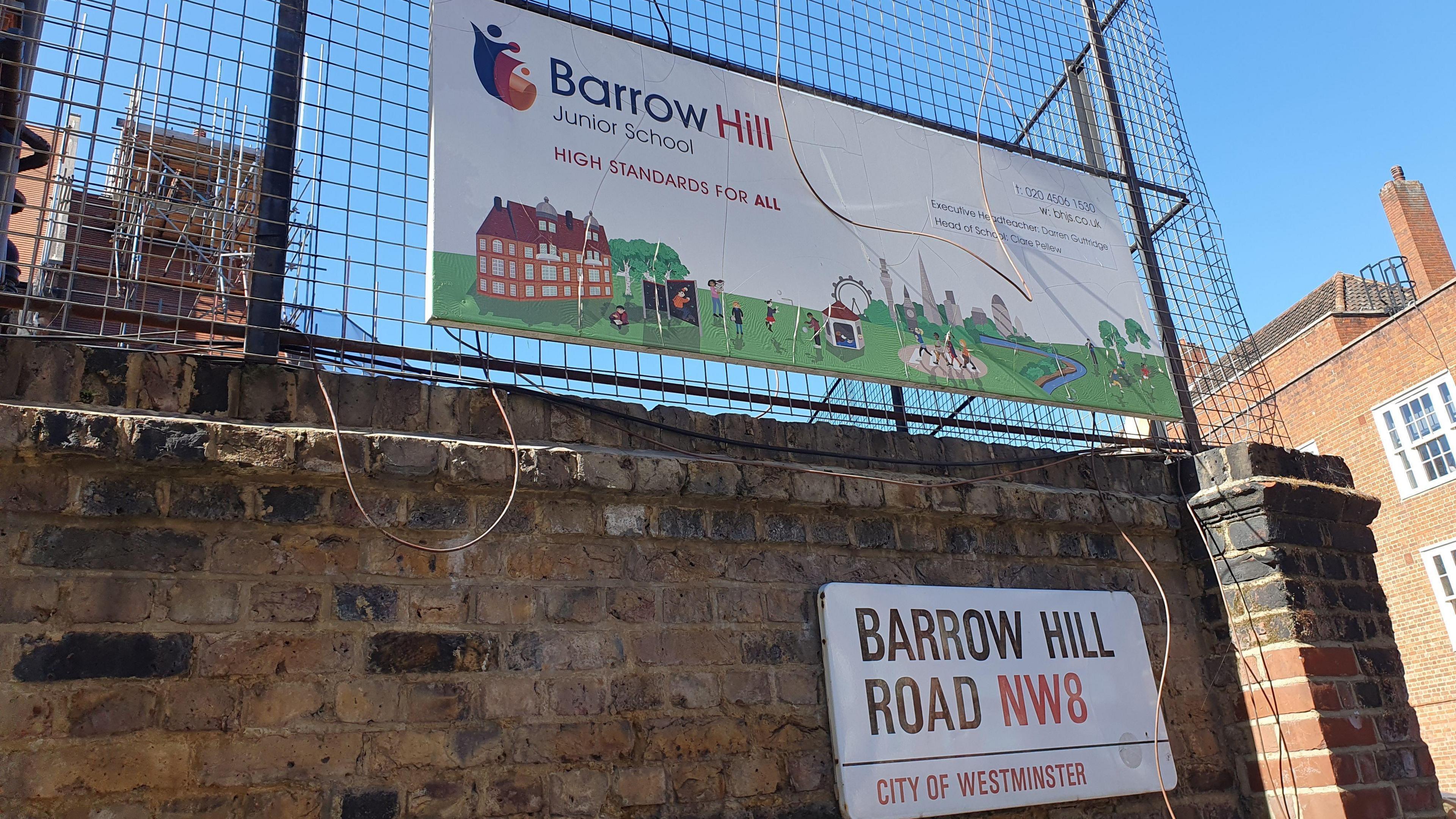 Sign showing Barrow Hill Junior School outside the school gates