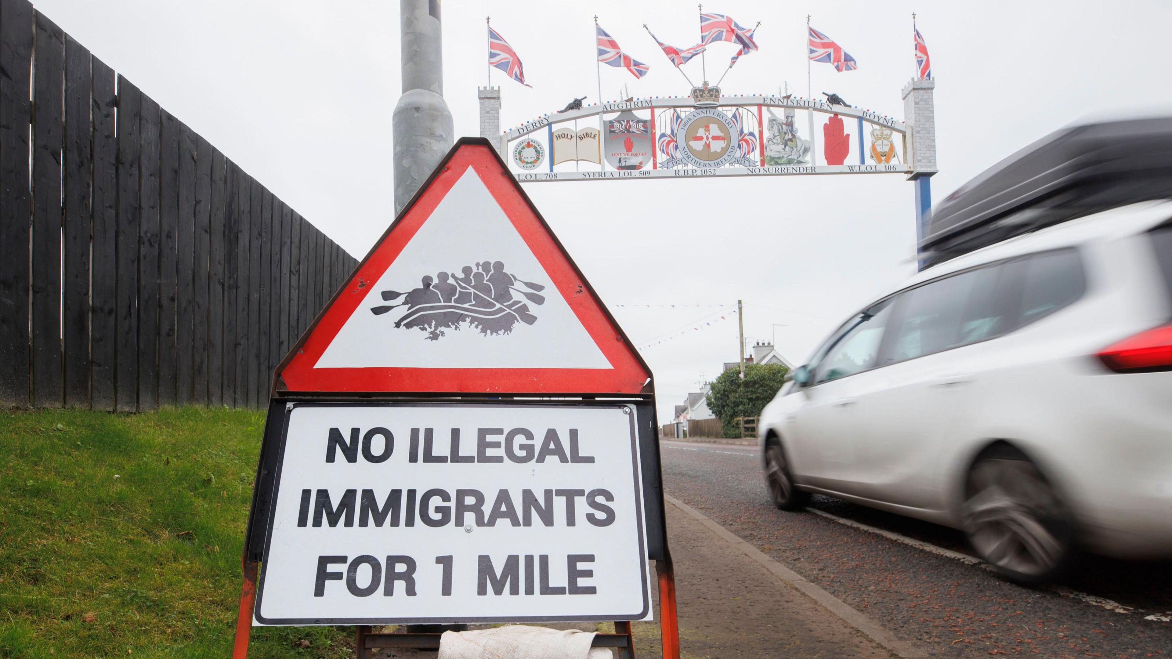 A road sign had been stolen and painted over with an anti-immigrant slogan and placed on the road side in Moygashel, County Tyrone