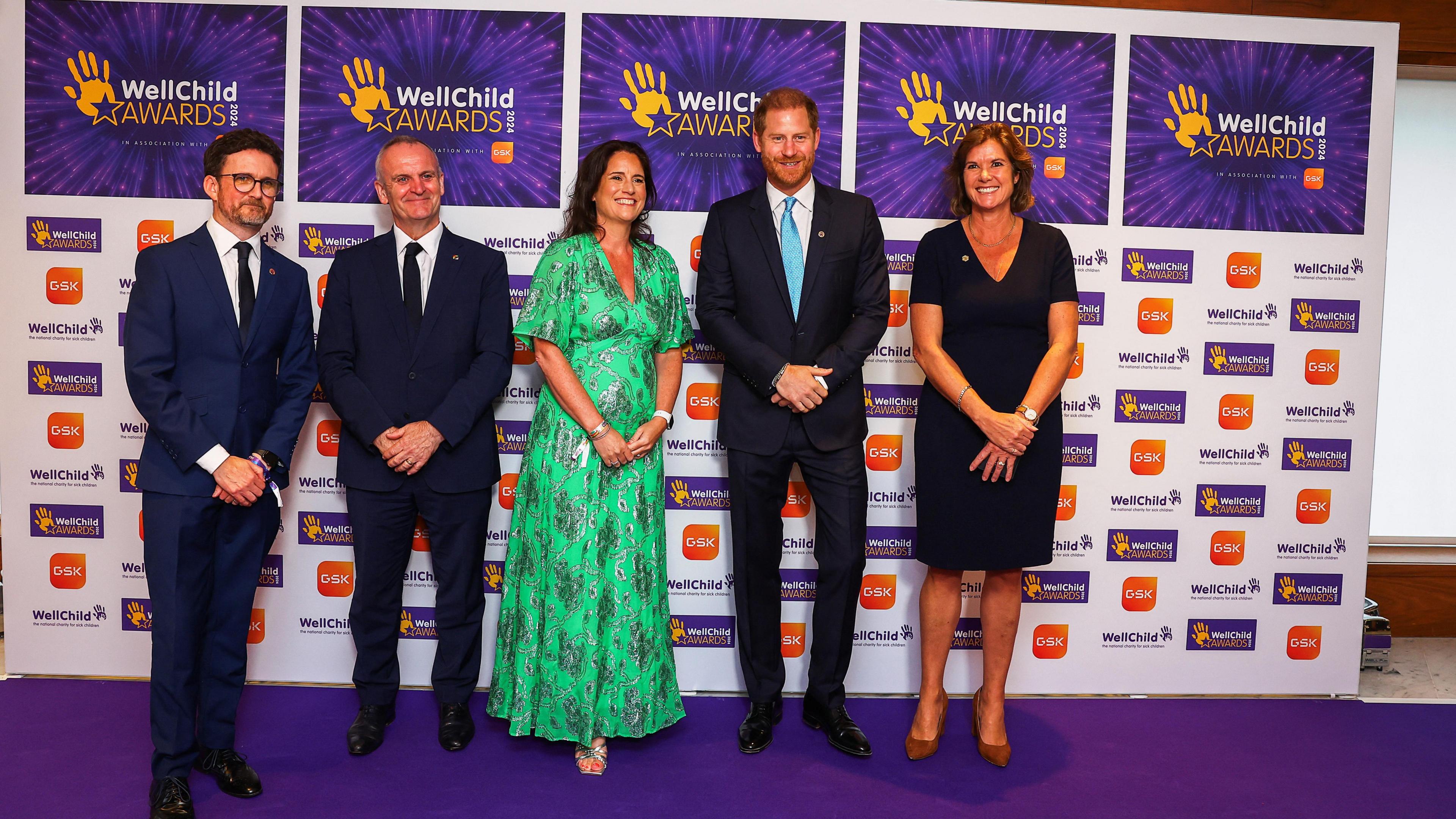 Prince Harry poses for a picture with General Manager at Royal Lancaster Hotel Sally Beck, Wellchild CEO Matt James, Wellchild Chair of Trustees Craig Hatch, GSK SVP Global Communications and CEO Office Sally Jackson