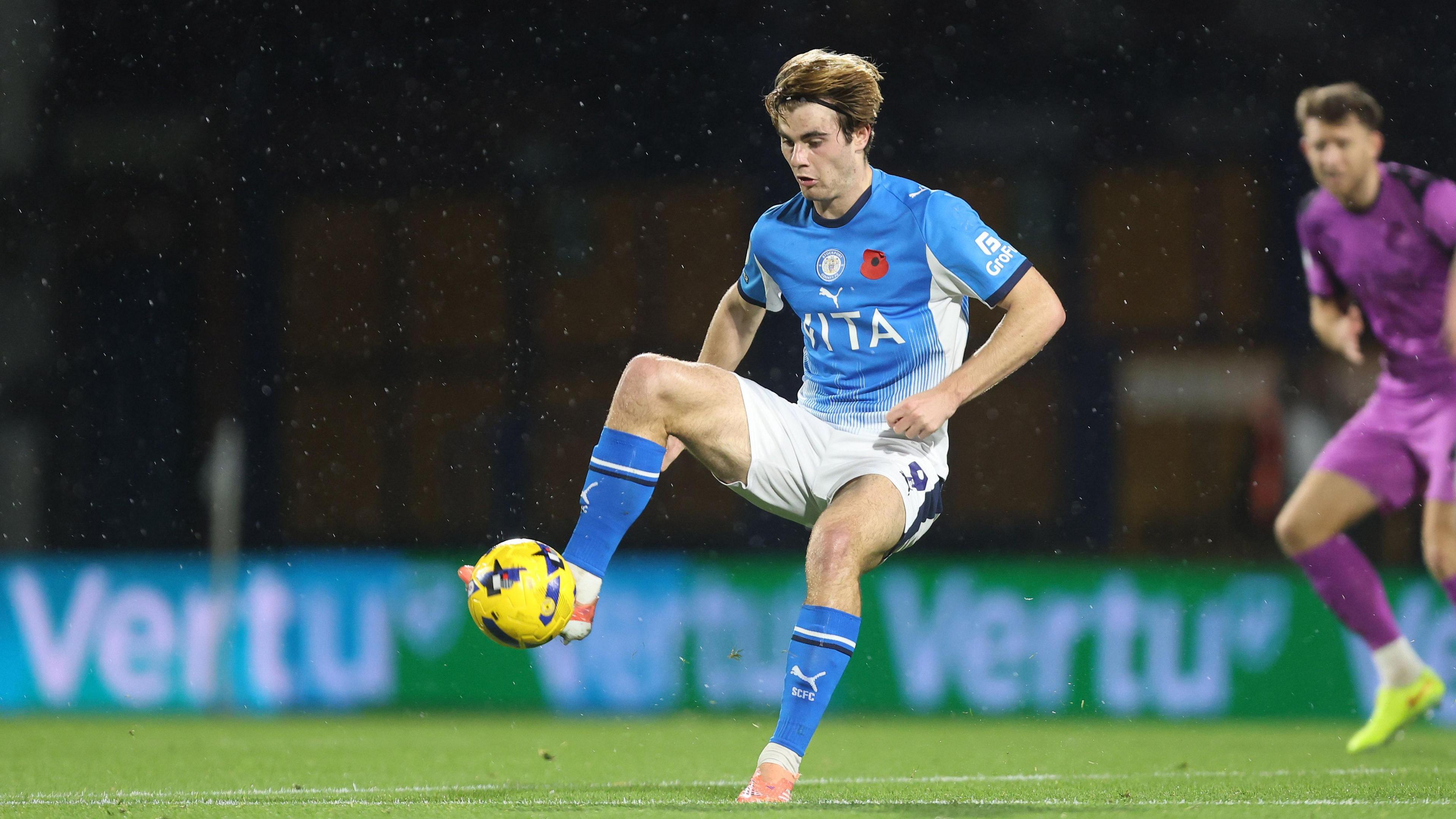 Nathan Lowe controlling the ball