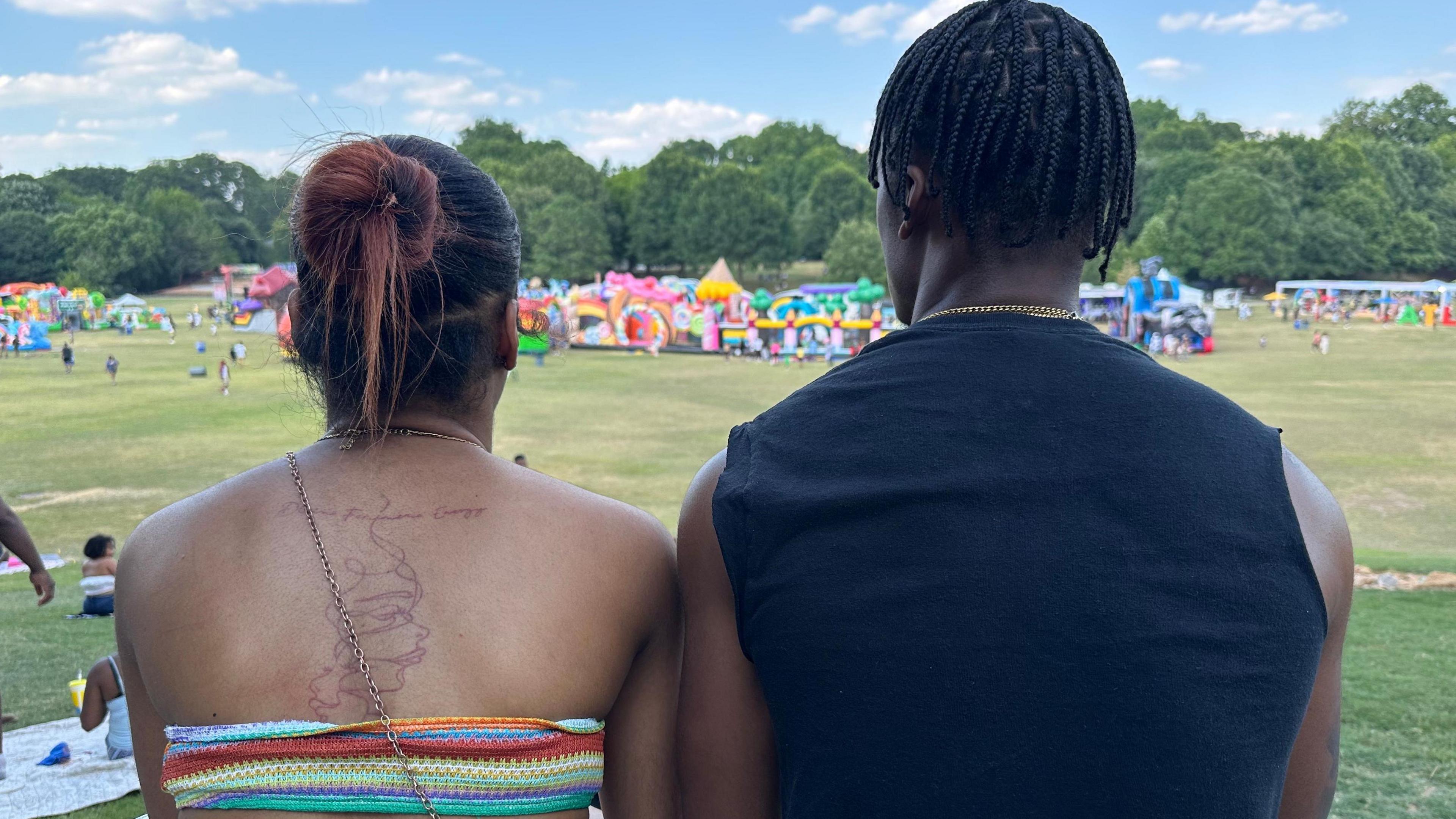 Shaun Gray and his girlfriend watch the Juneteenth celebrations in Atlanta, Georgia