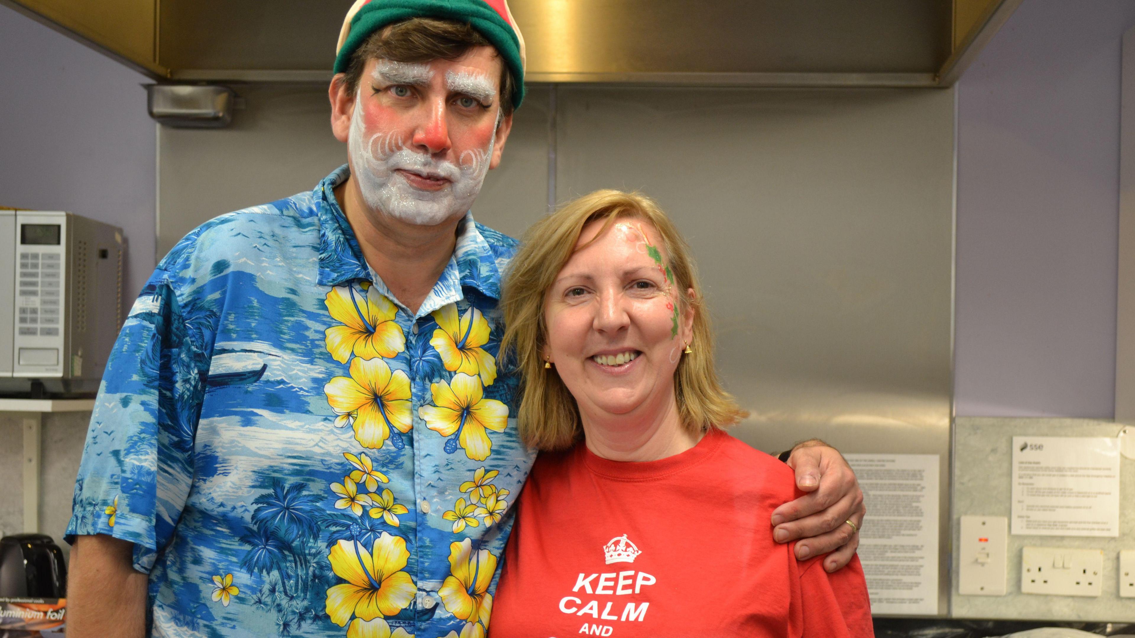 Simon and Sarah Thompson dressed with festive face paint pictured during one of the previous events