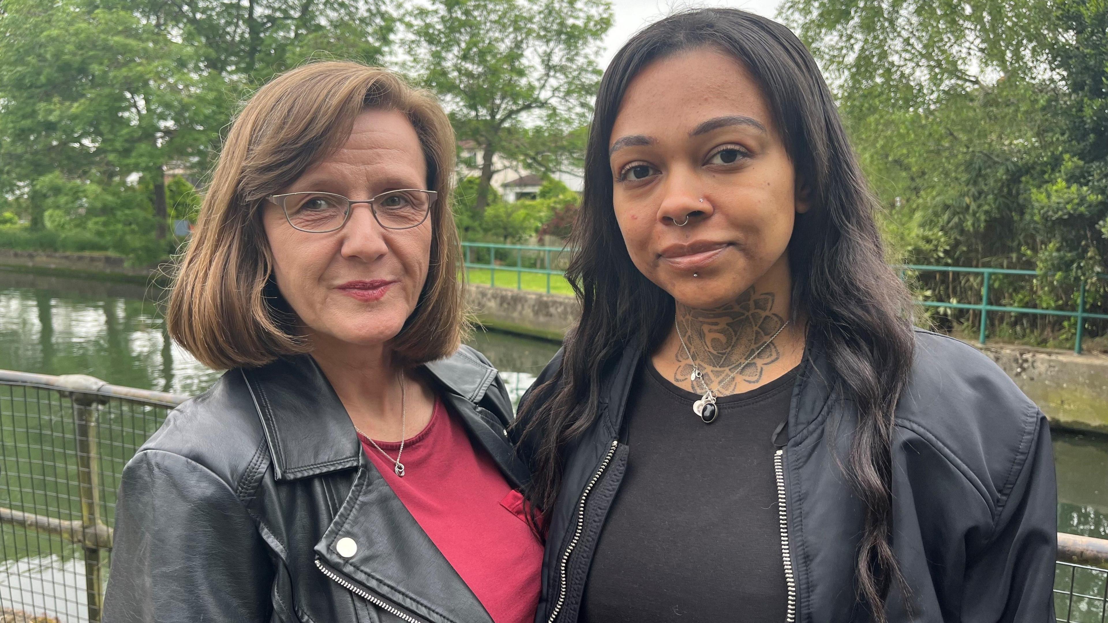 Vanessa Abbess (left) and Stephanie Williams, both wearing black jackets, stand next to each other facing the camera.