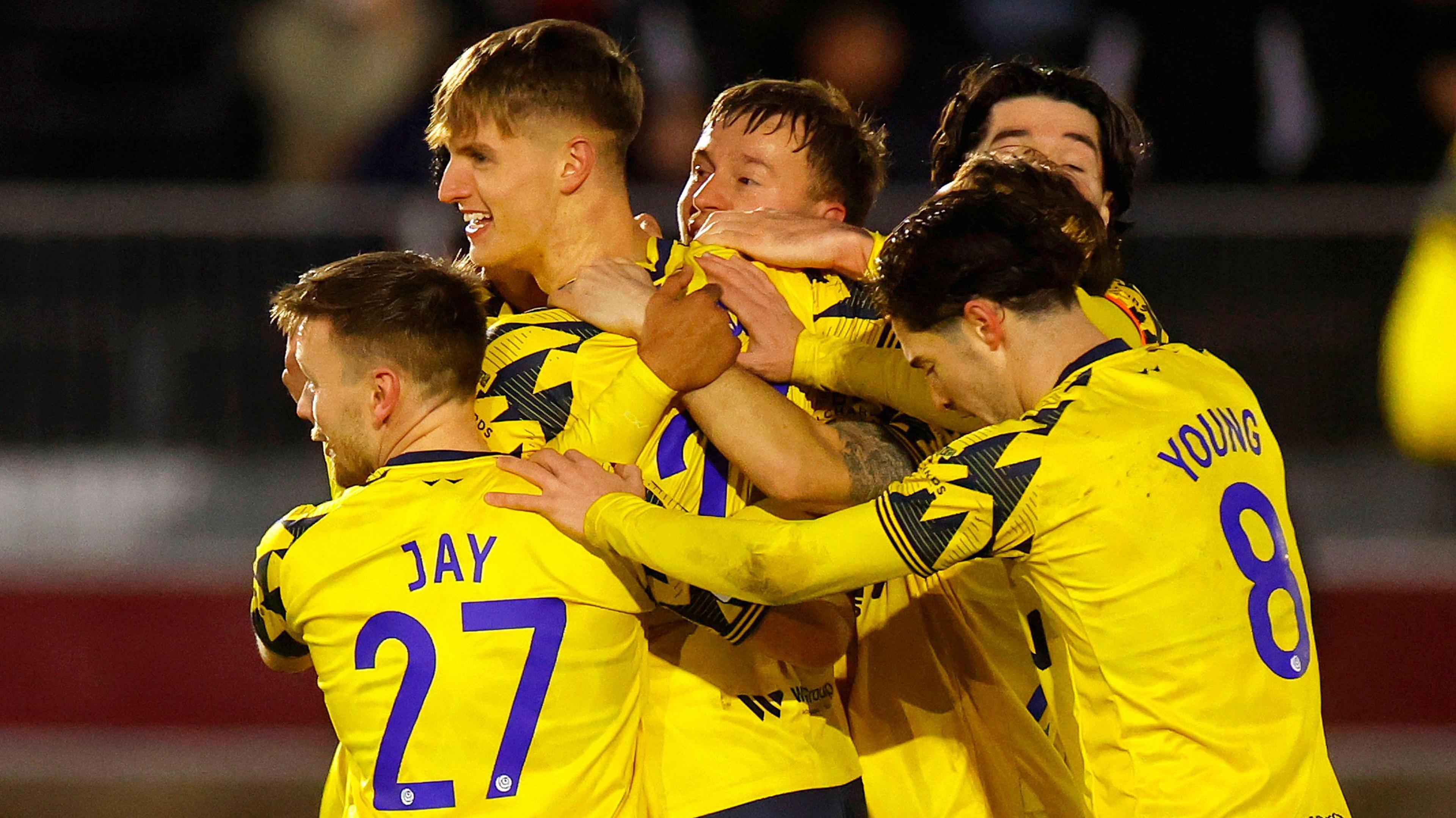 Kieran Wilson celebrates scoring on his debut for Torquay United