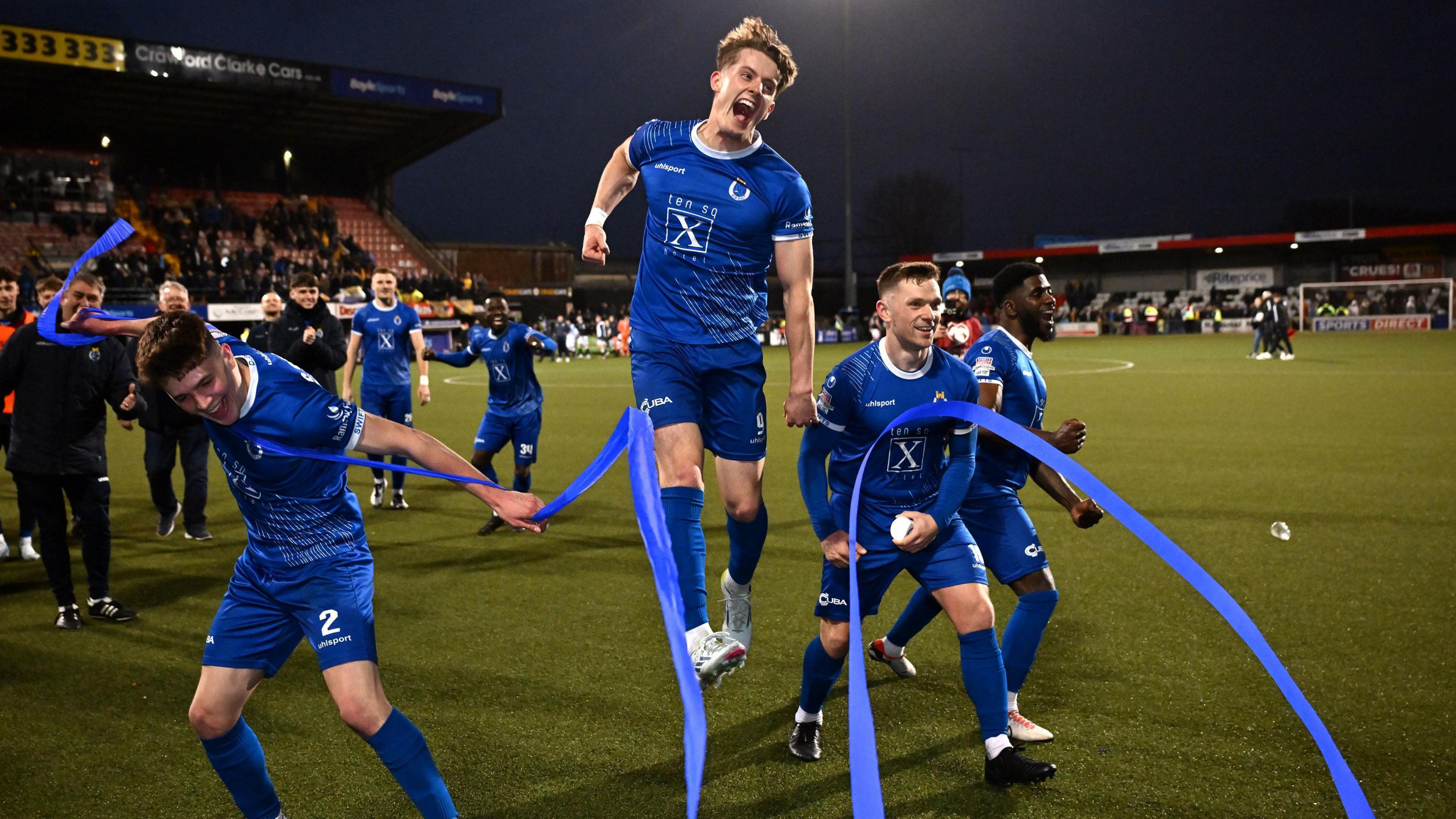 Dungannon Swifts players celebrate reaching the Irish Cup final