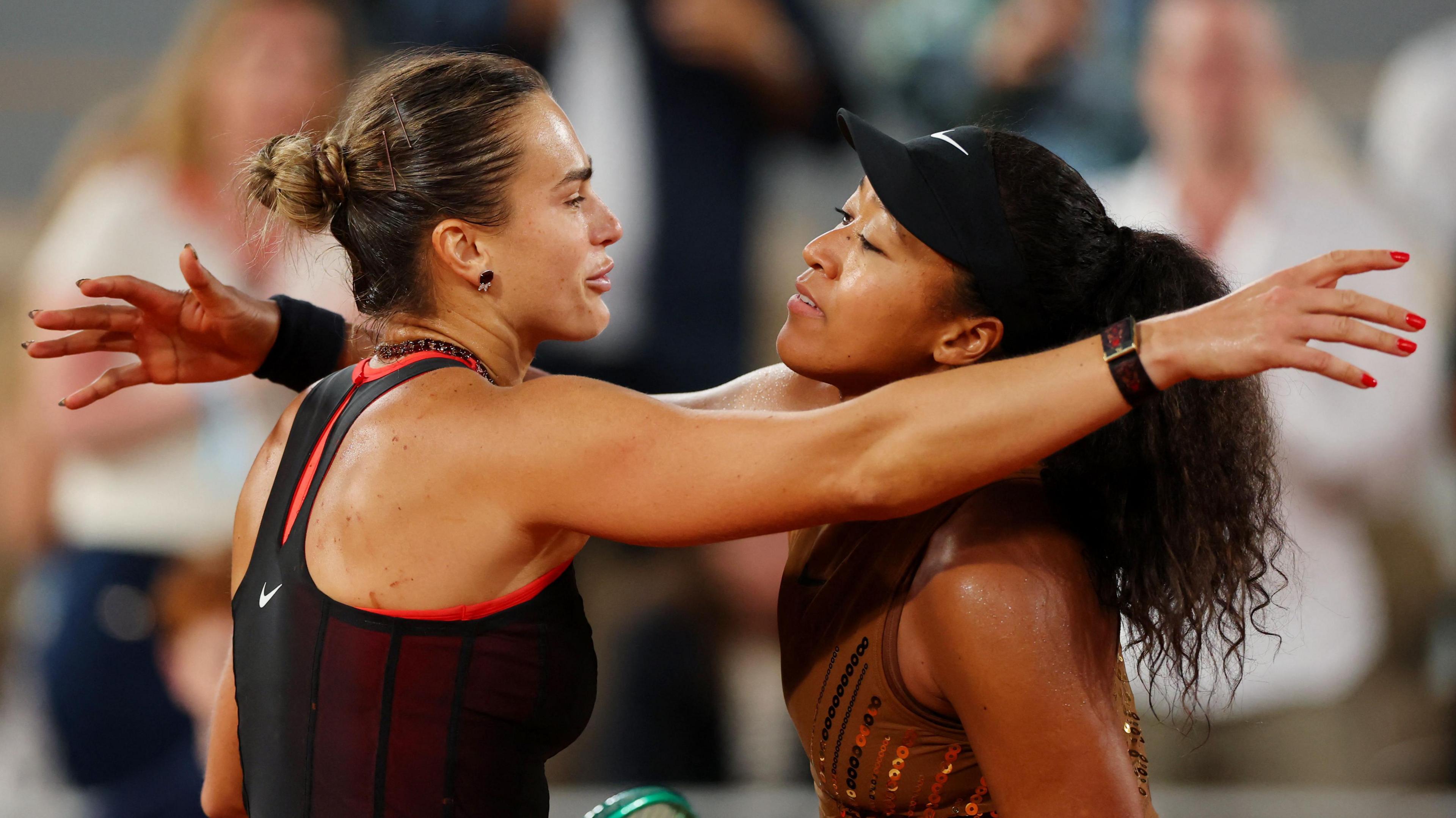 Aryna Sabalenka and Naomi Osaka hug after French Open match 