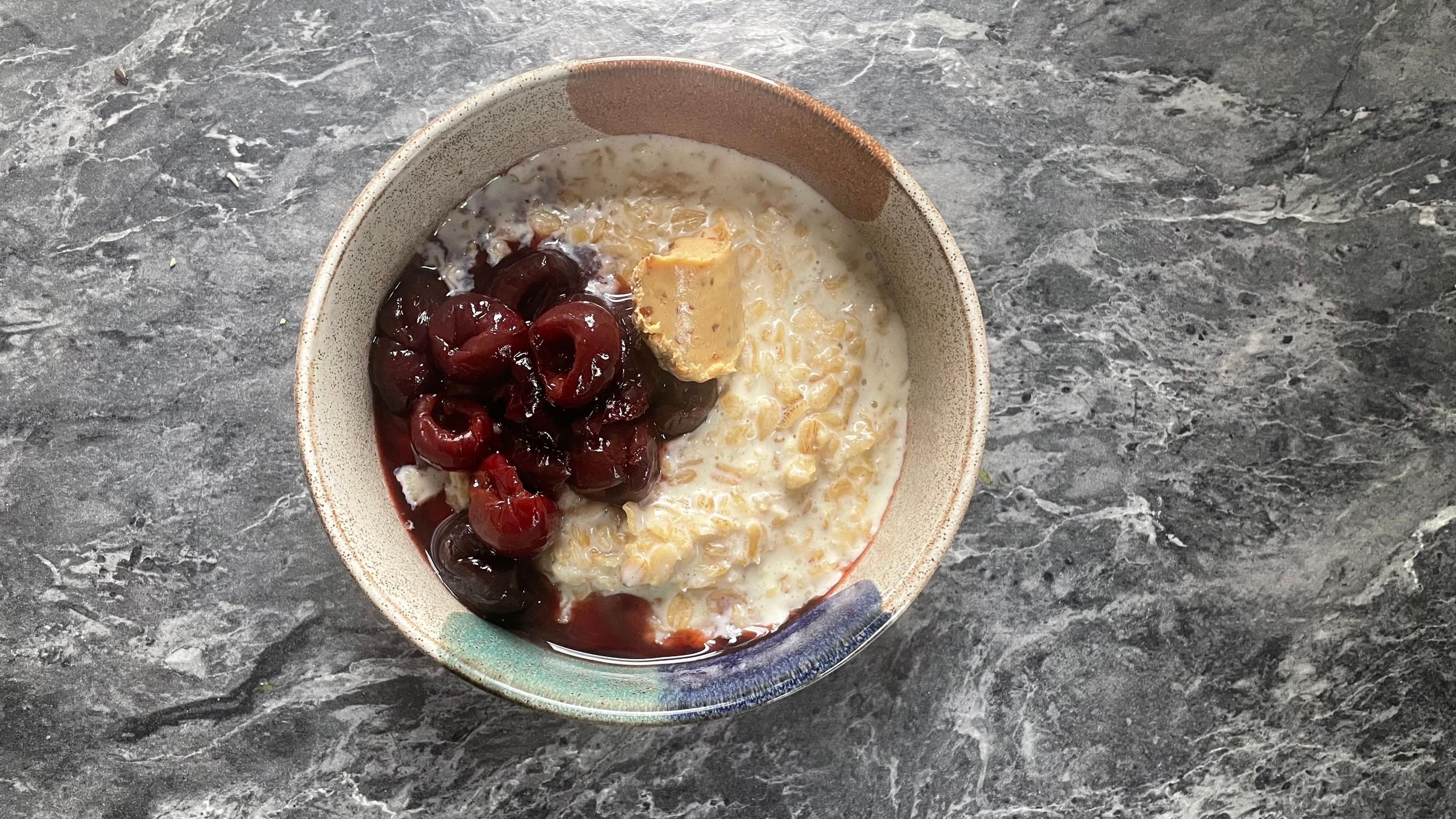 A bowl of porridge and fruit