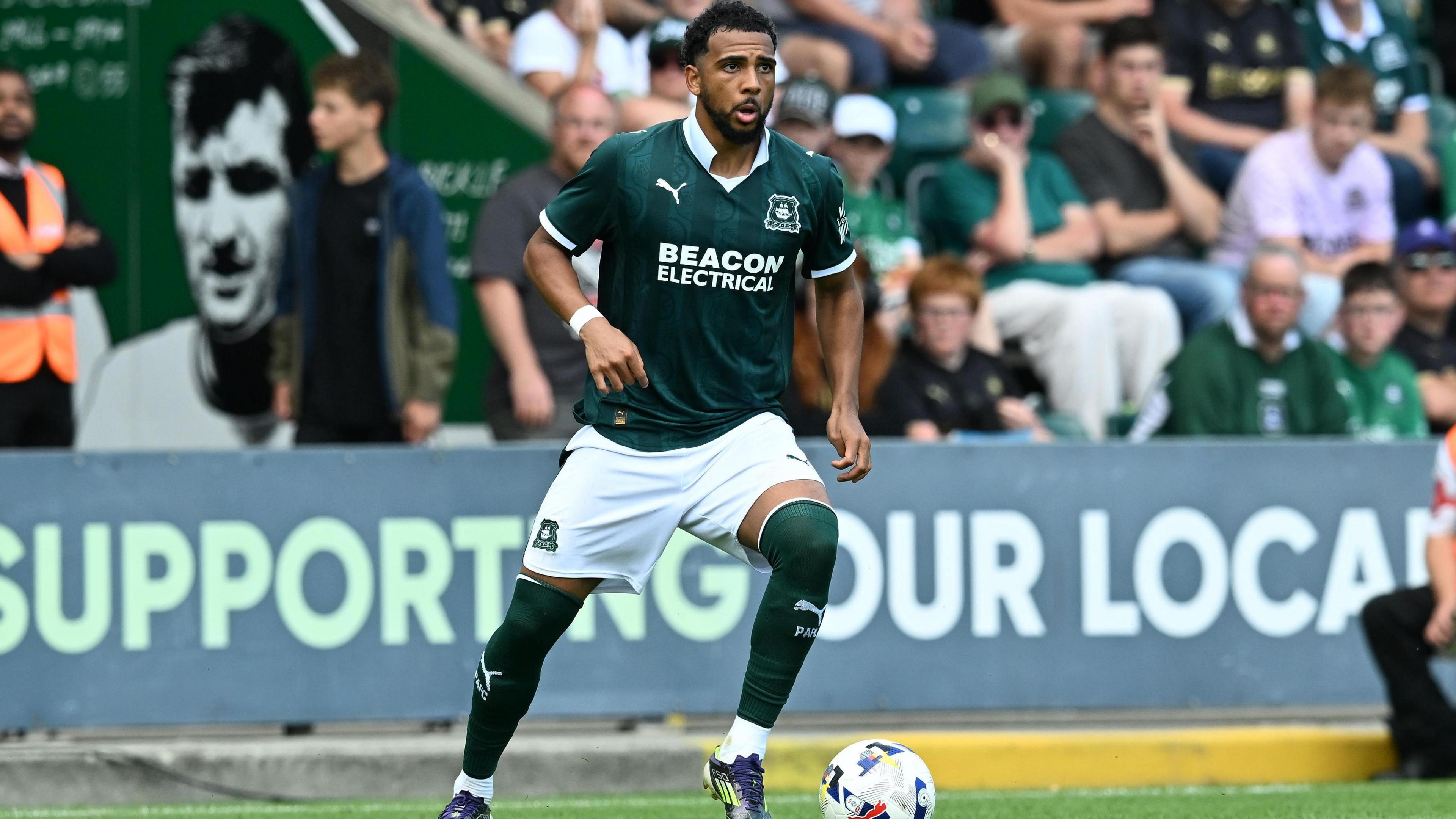 Plymouth Argyle midfielder Xavier Amaechi