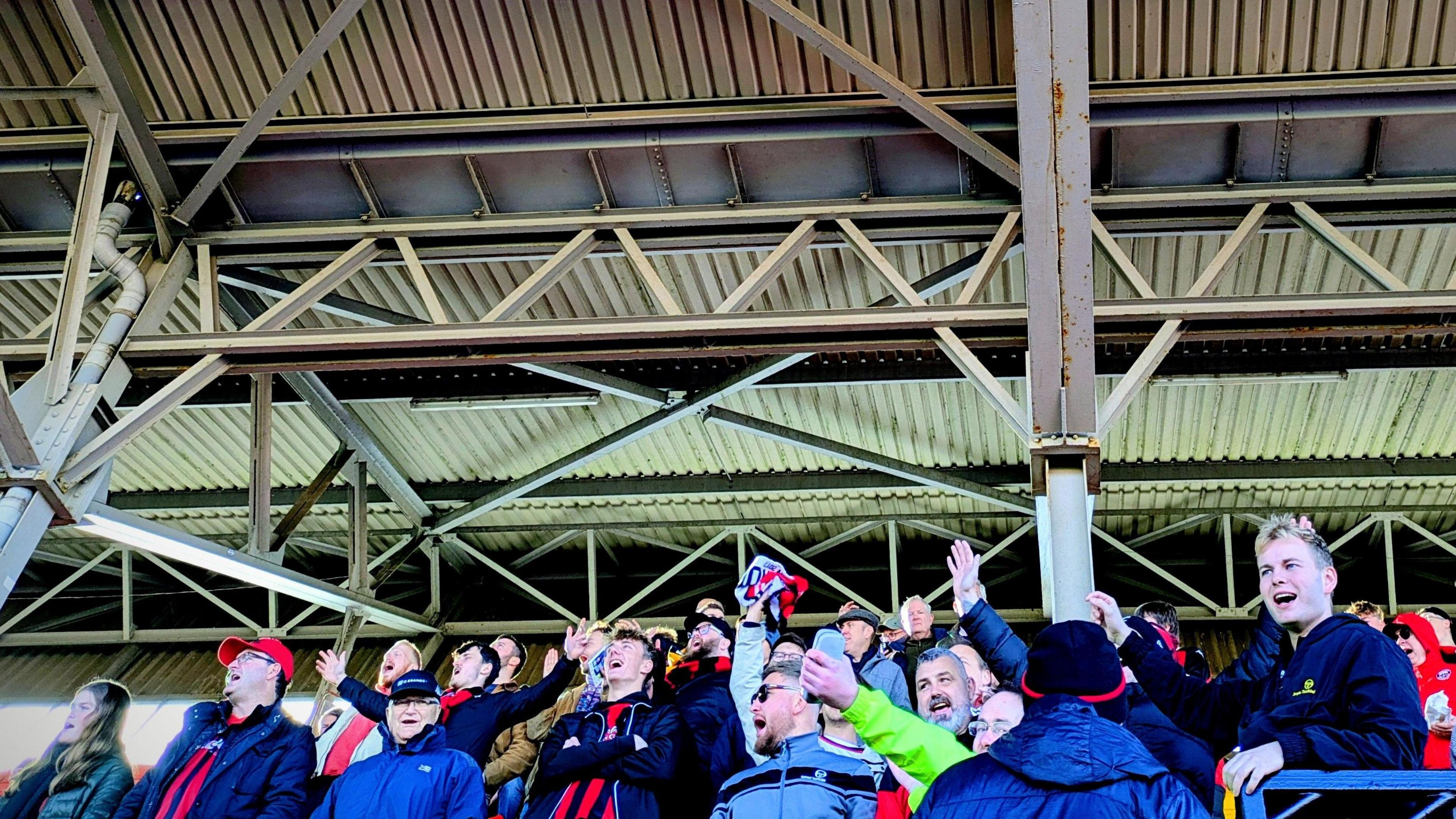 Truro City fans celebrate one of the club's goals against Gateshead in the National League