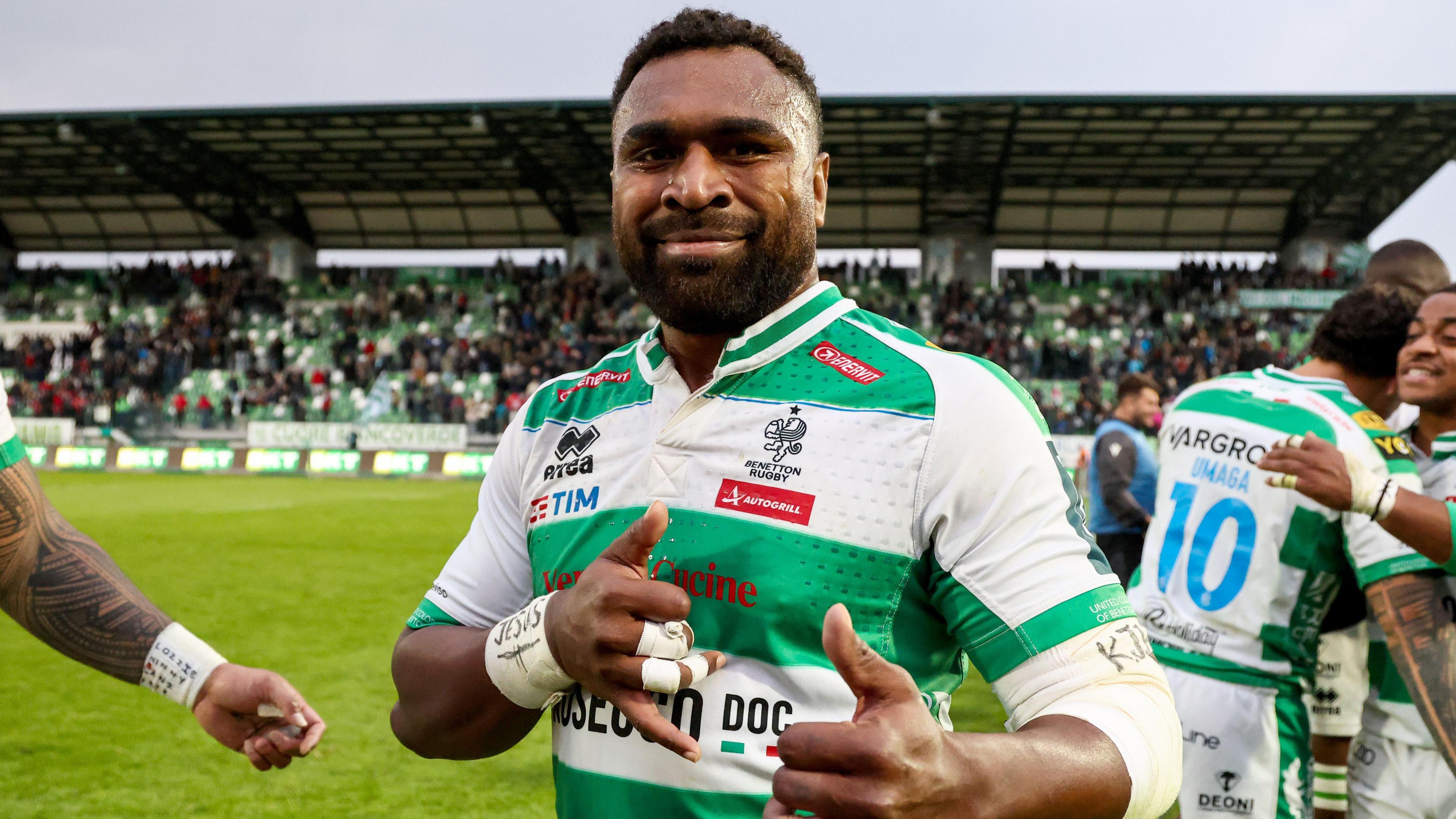 Onisi Ratave celebrates after Benetton's win against Ospreys