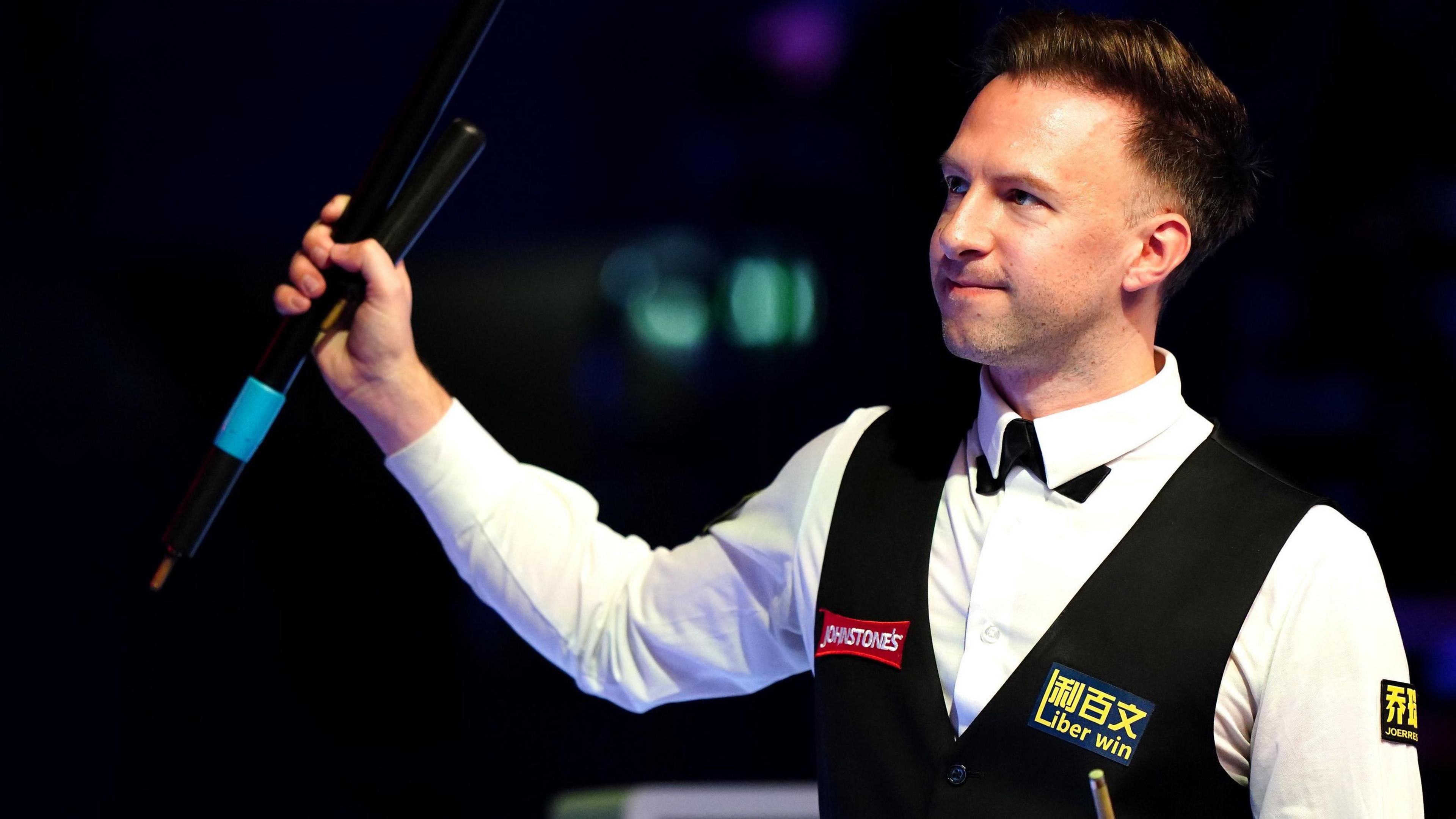 Judd Trump celebrates his quarter-final win at the Masters