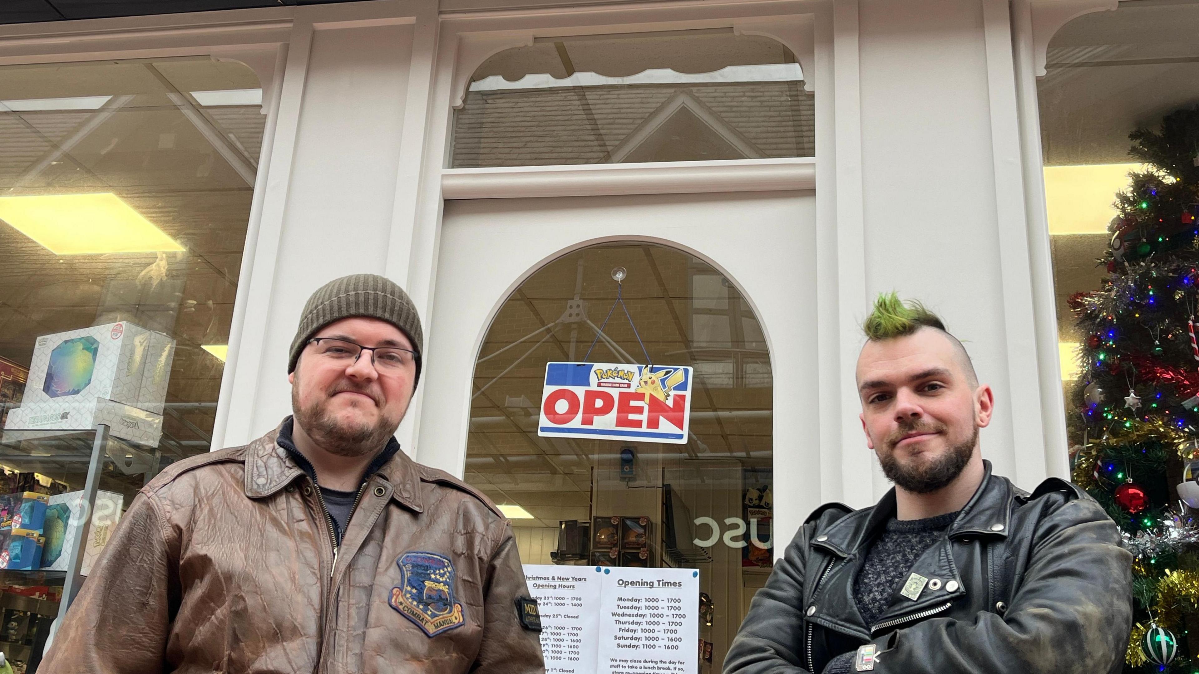 Shop-owners Aaron Purvor and Mido Ringer outside the entrance to their Pokemon merchandise story Geckos in Wrexham.