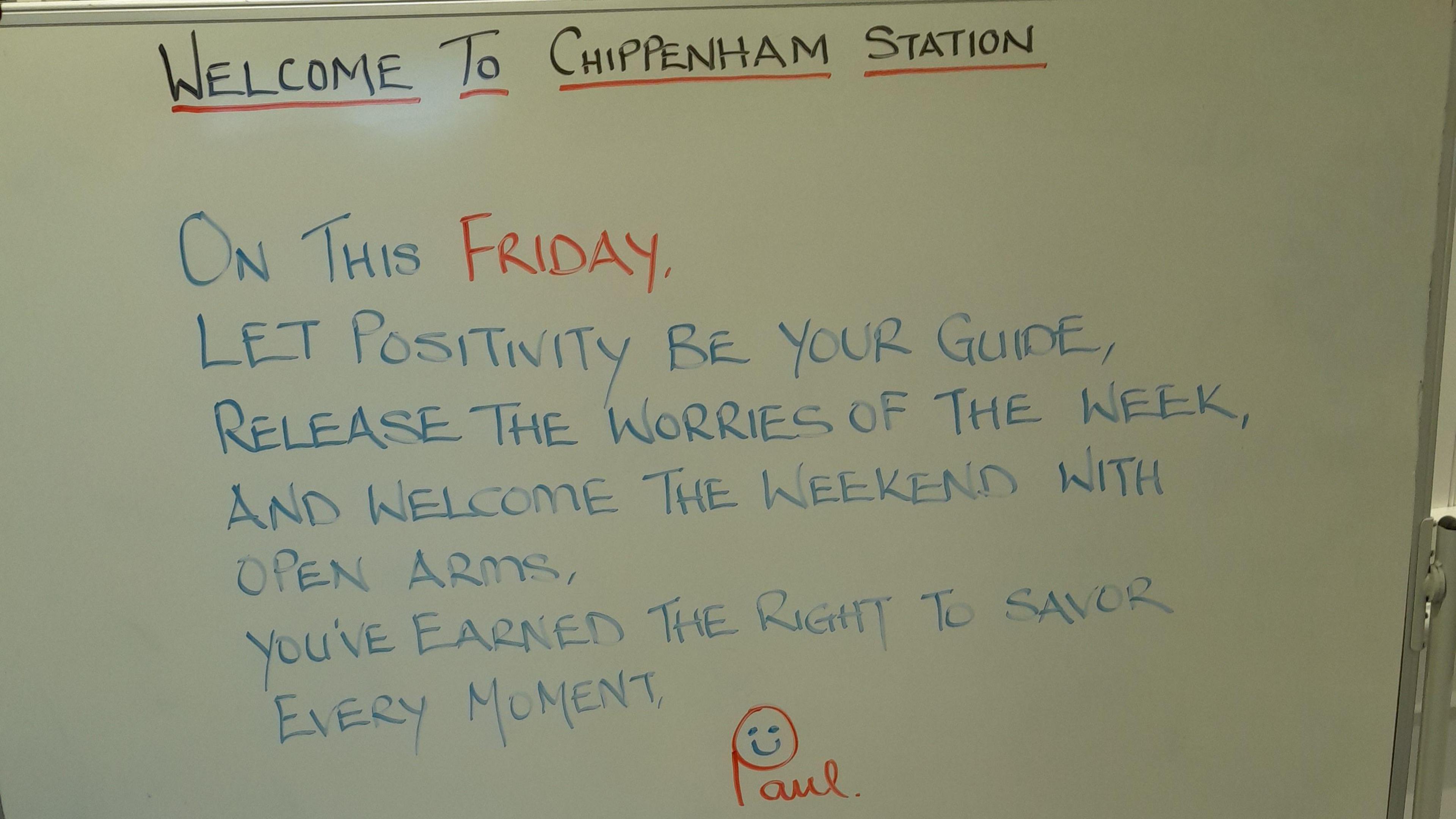 A whiteboard message board that says Welcome to Chippenham Station, along with a positive quote for Friday