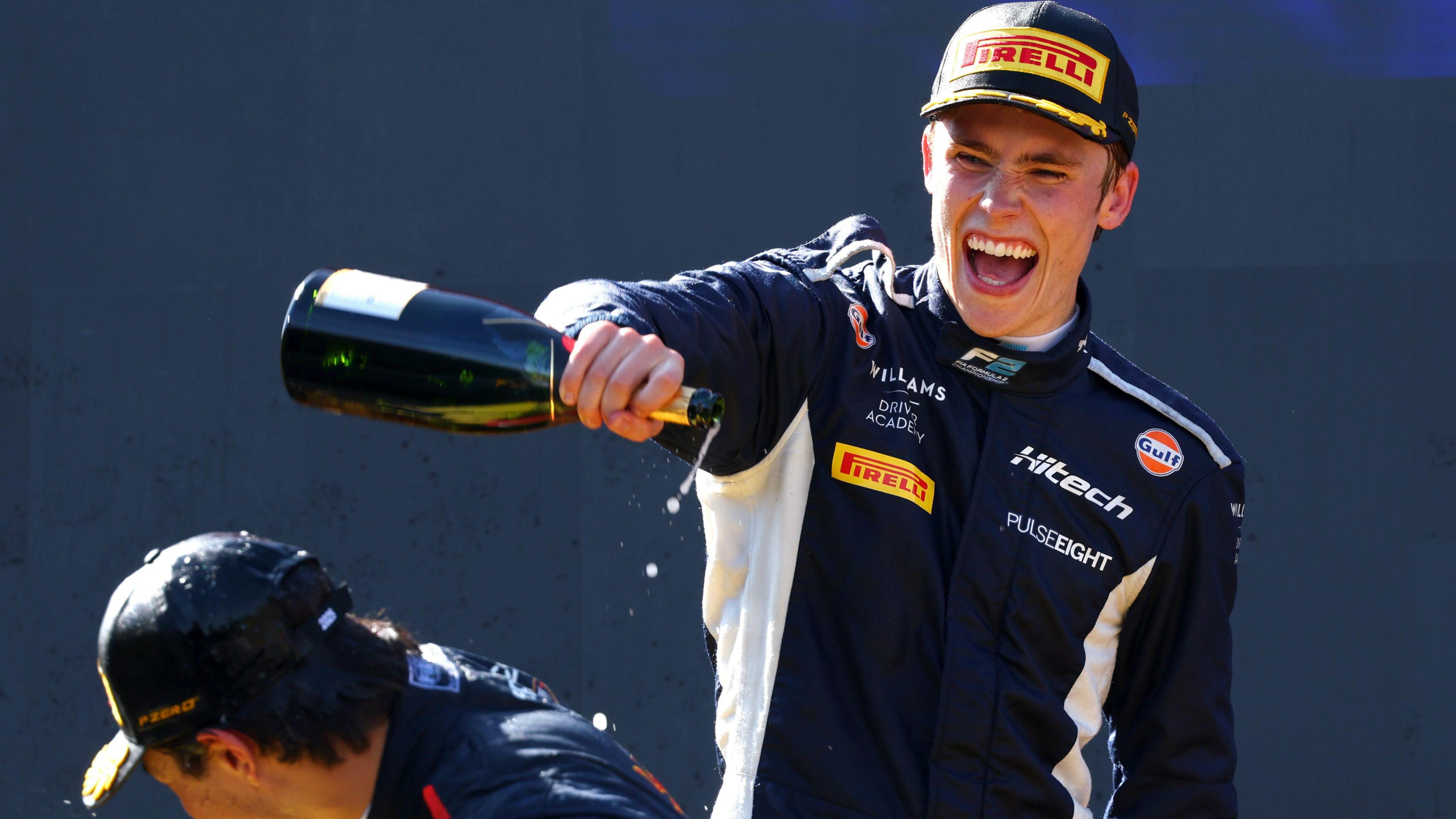 Race winner Luke Browning celebrating his first Formula 2 victory at Monza, Italy. He is spraying champagne at third placed Josep Maria Marti of Spain.