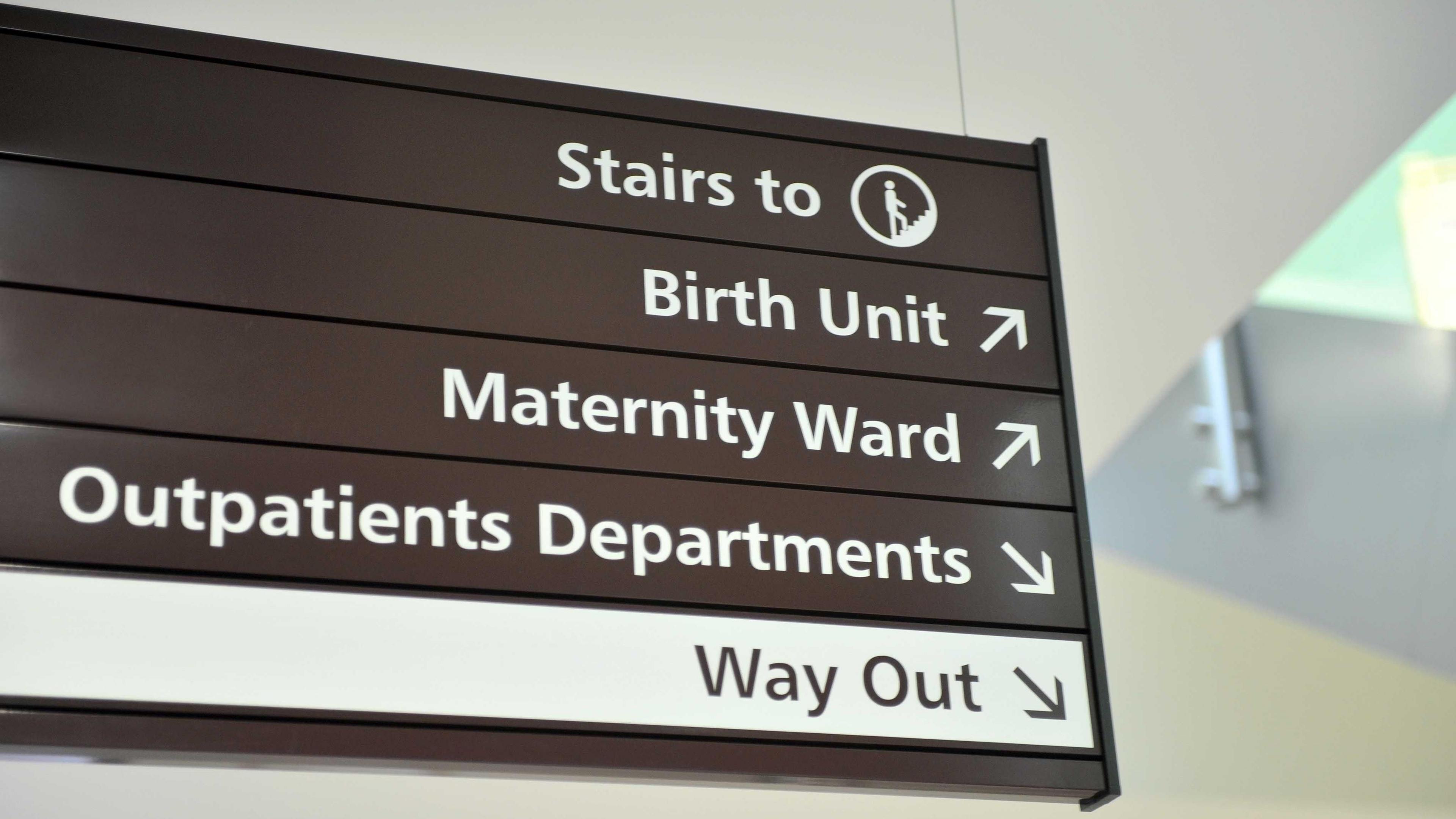 A sign for the Birth Unit, Maternity Ward and Outpatients Department at the Women's Centre at the Royal Gloucestershire Hospital