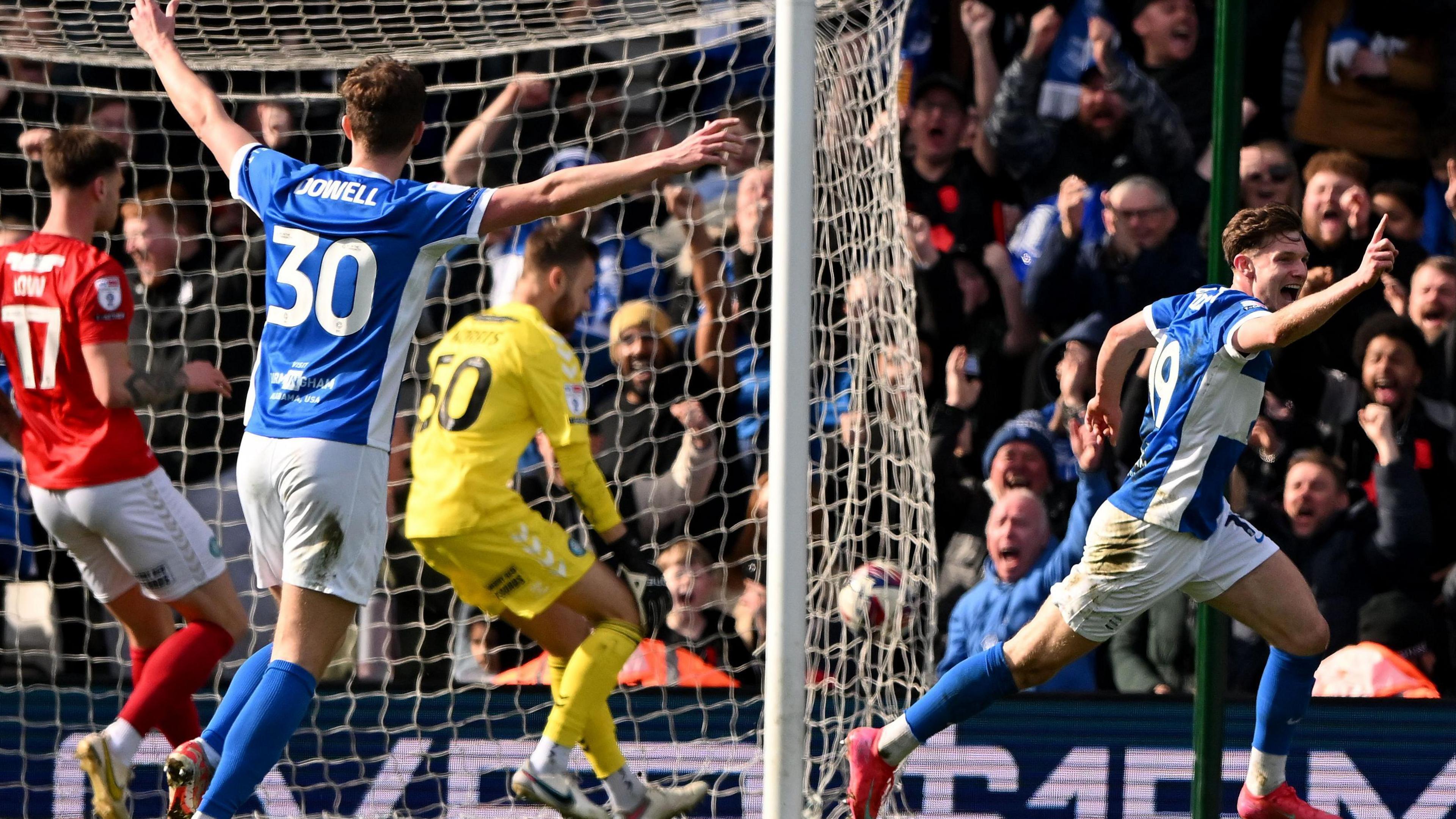 Taylor Gardner-Hickman celebrates Blues' first-half winner against second-placed Wycombe on Saturday