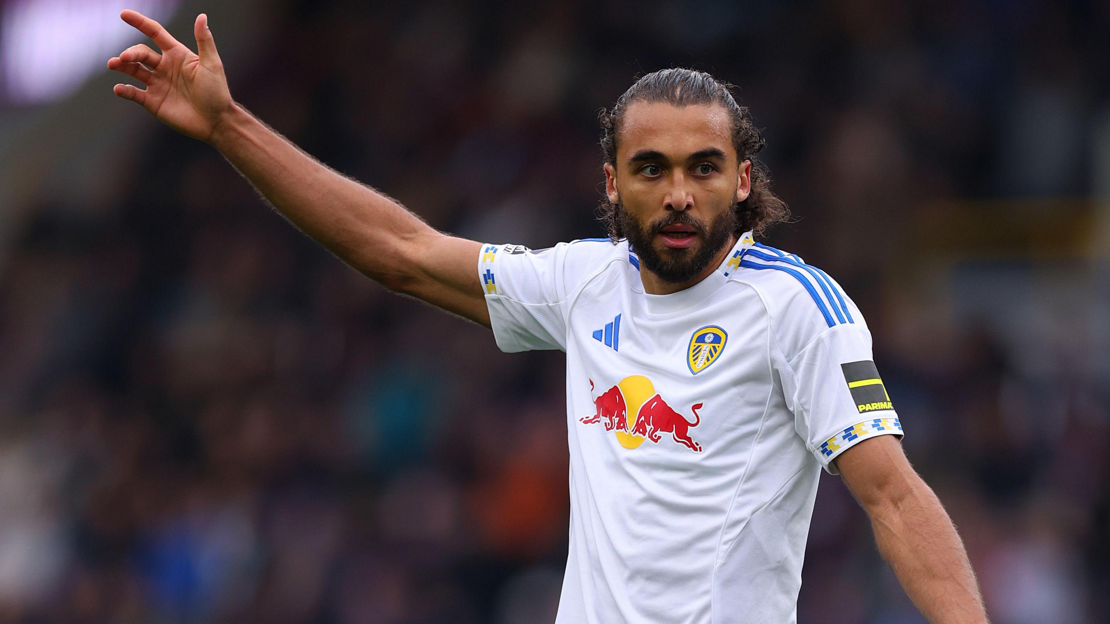 Dominic Calvert-Lewin gives instructions while in action for Leeds