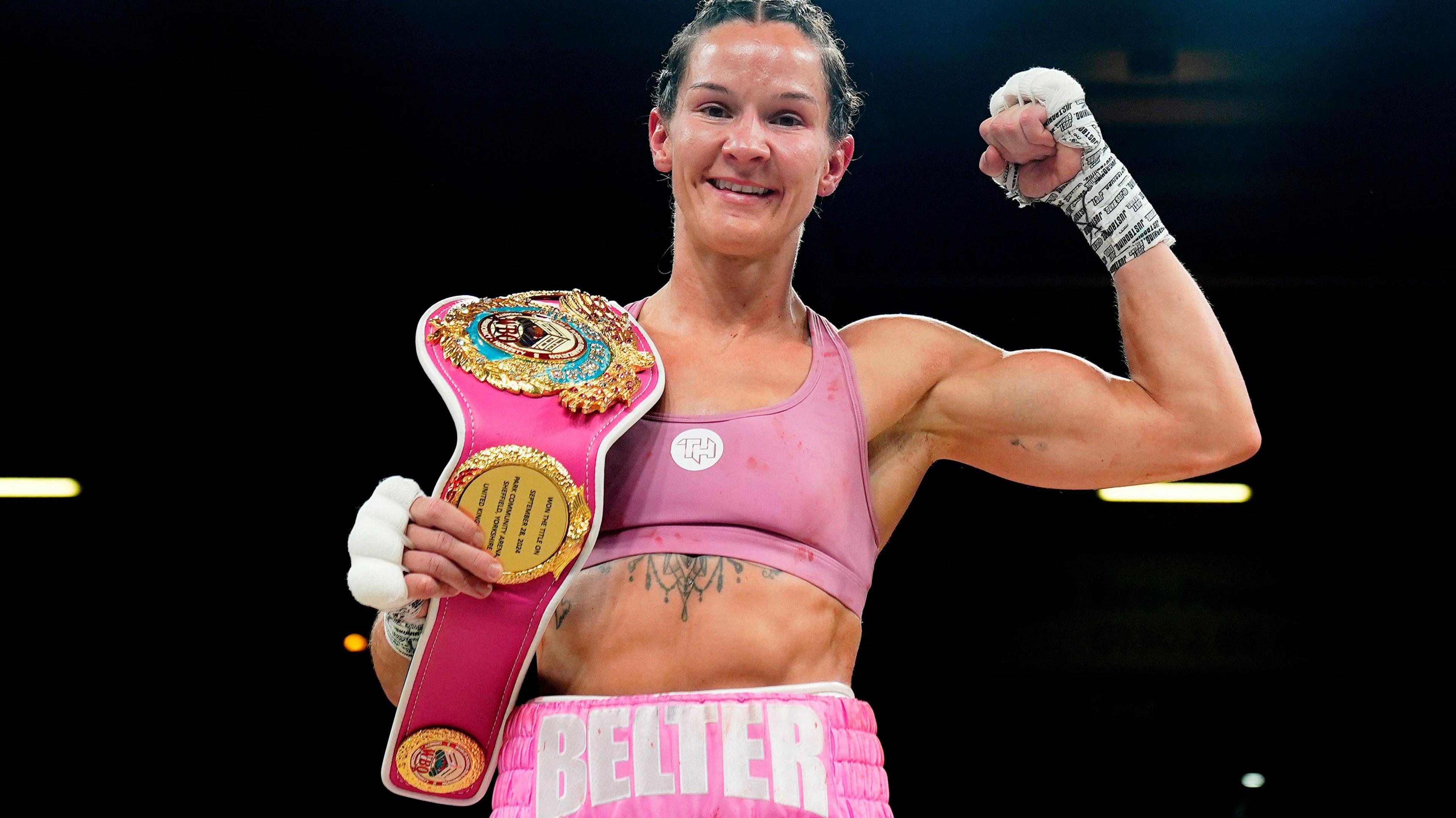Terri Harper celebrates with belt