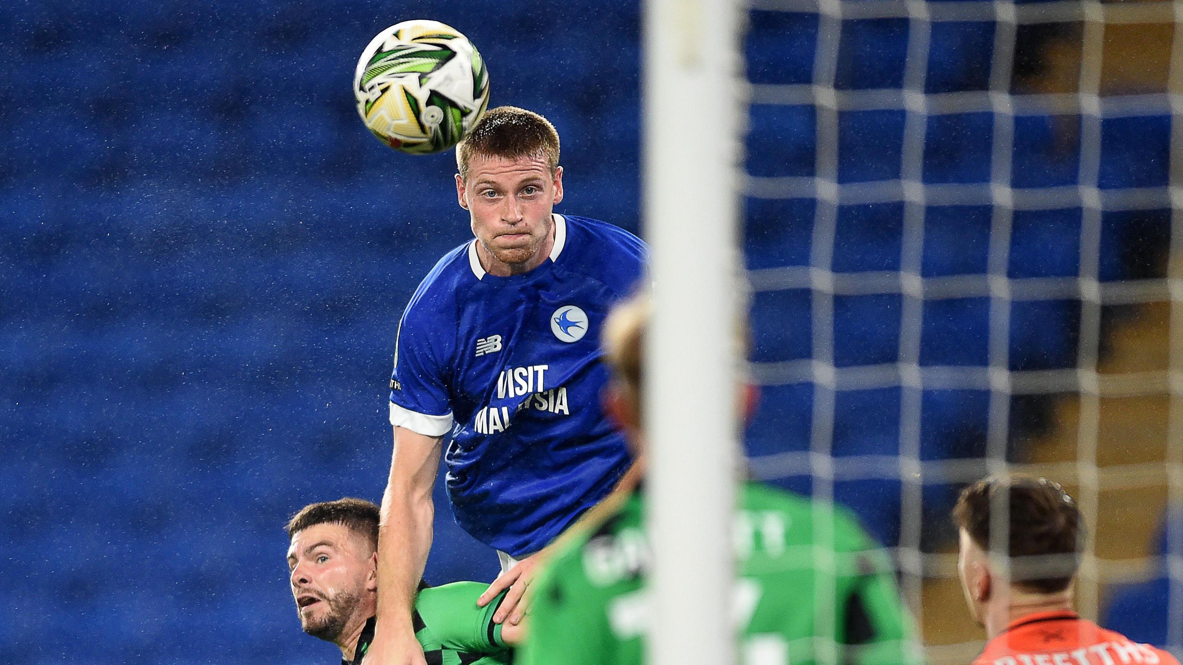 Mark McGuinness heads Cardiff City in front