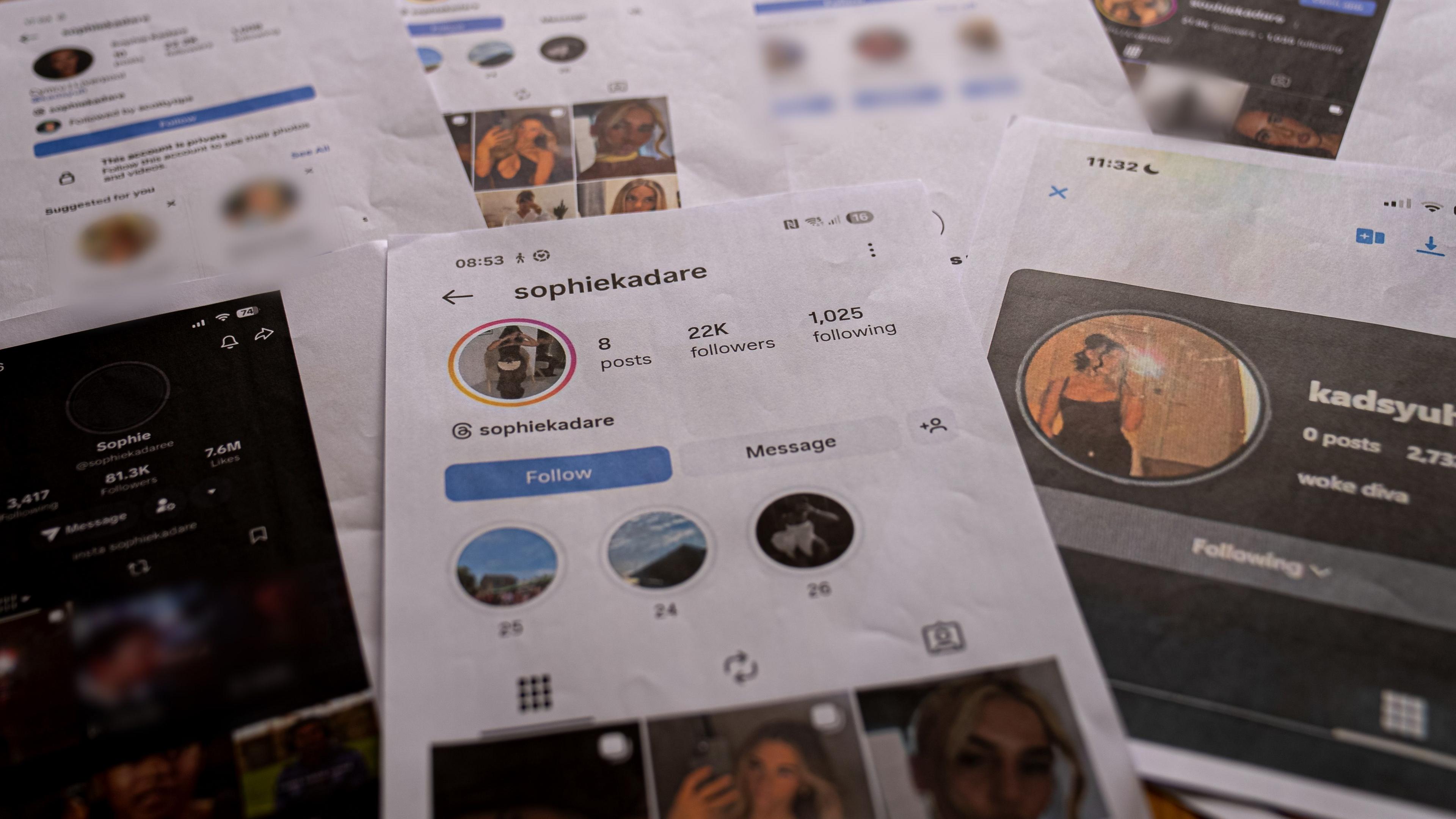 Seven A4 print outs of screenshots of the Sophie Kadare fake accouts laid out on a table. The main image in the middle shows the instagram account, which has 22k followers and eight posts, filled with Sasha's images. 