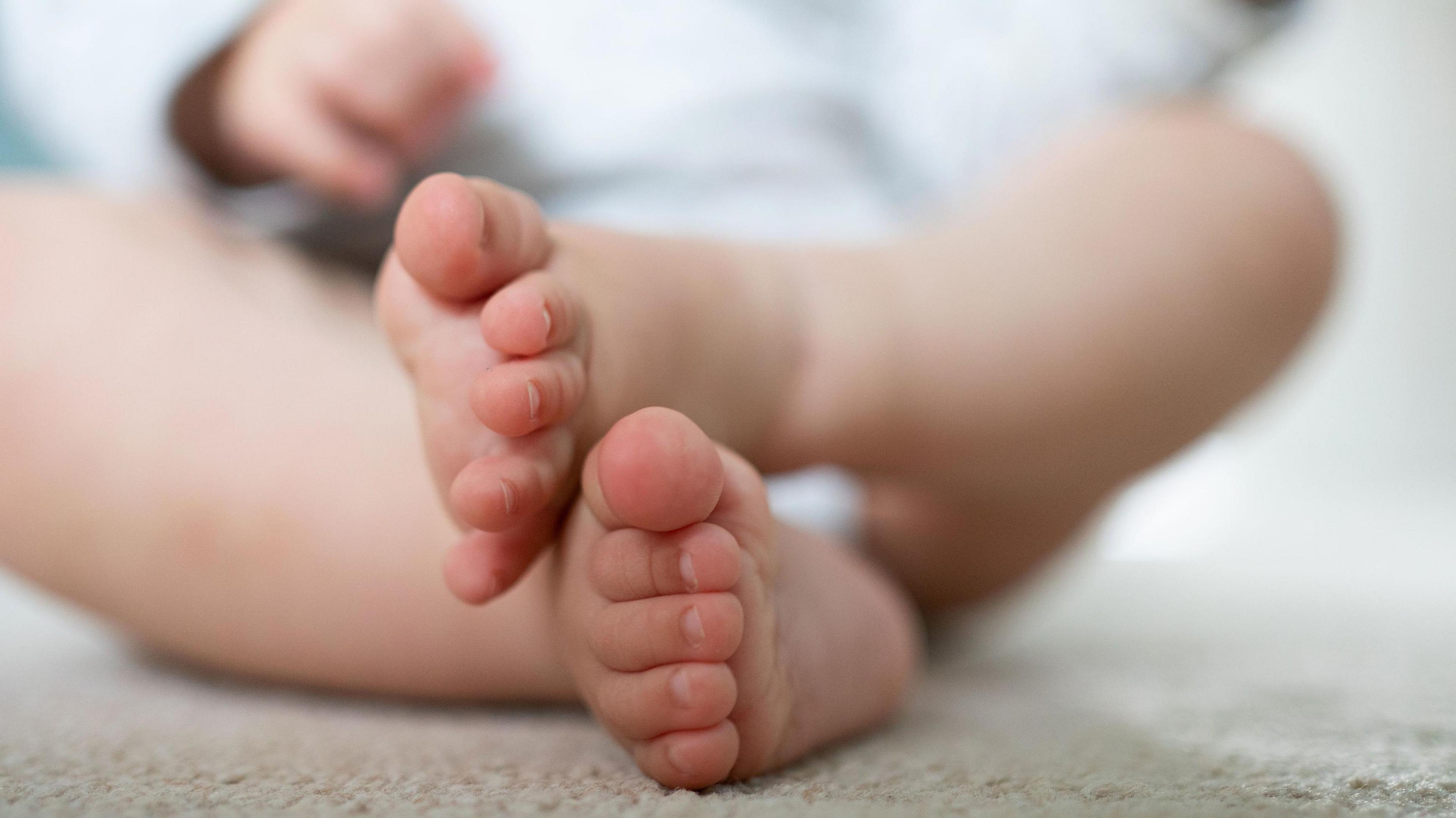 Picture of a young baby's feet
