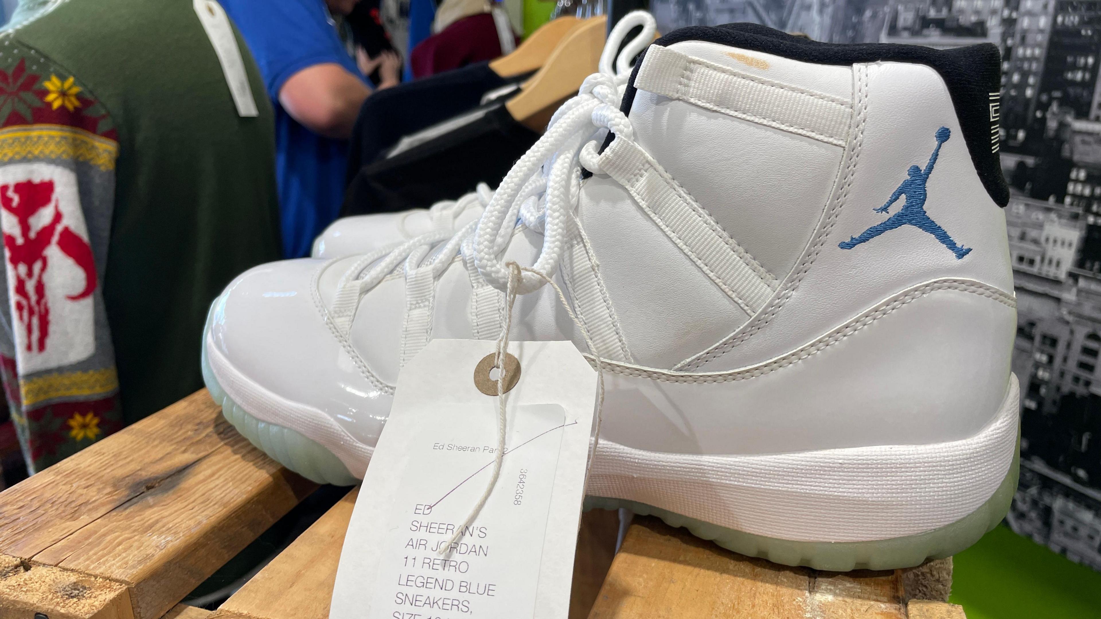 A white pair of Nike Air Jordan basketball shoes.