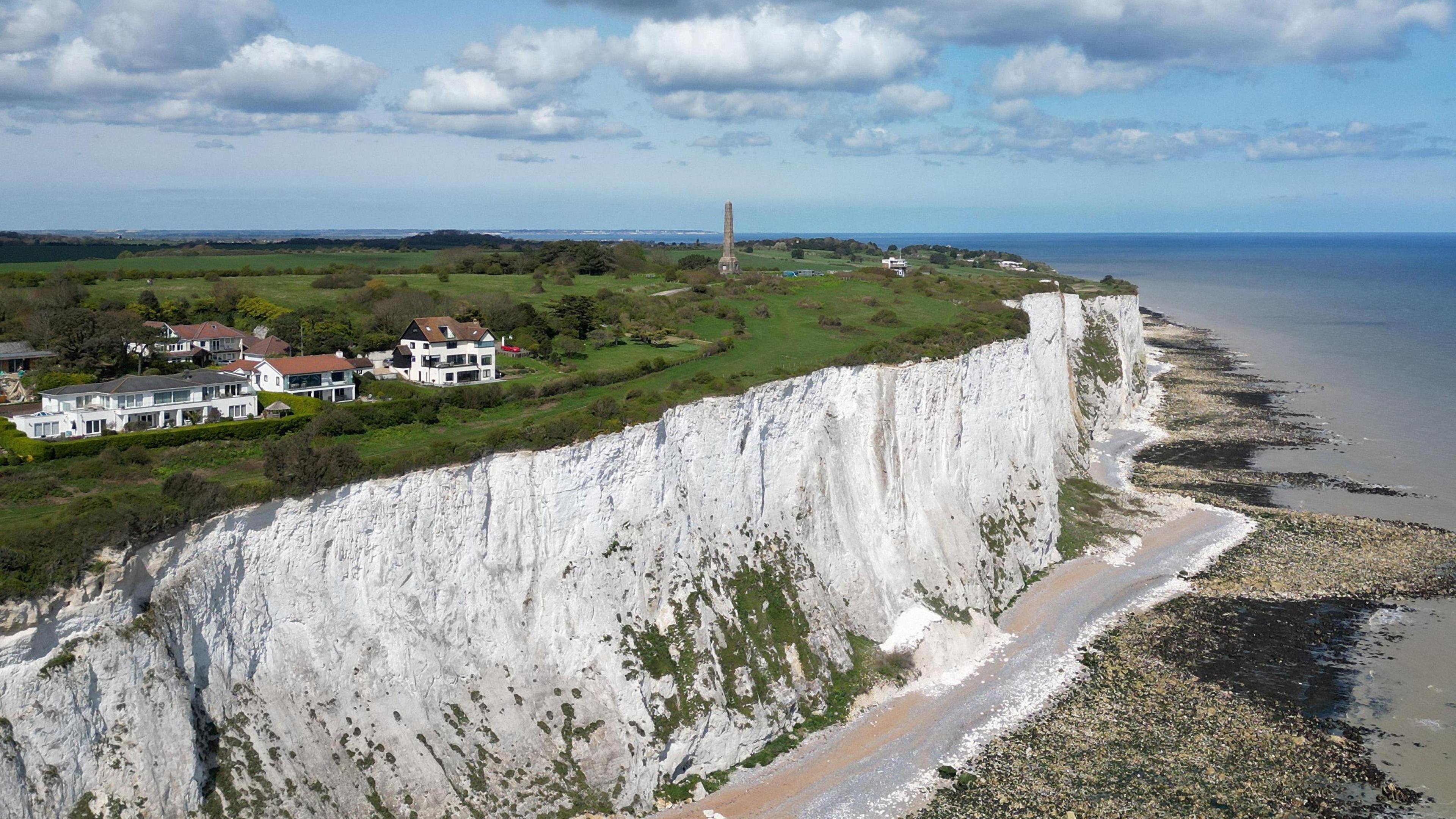 A drone view of the chalk cliffs at St Margaret's Bay and the English Channel near the coastal port town of Dover, Kent. 