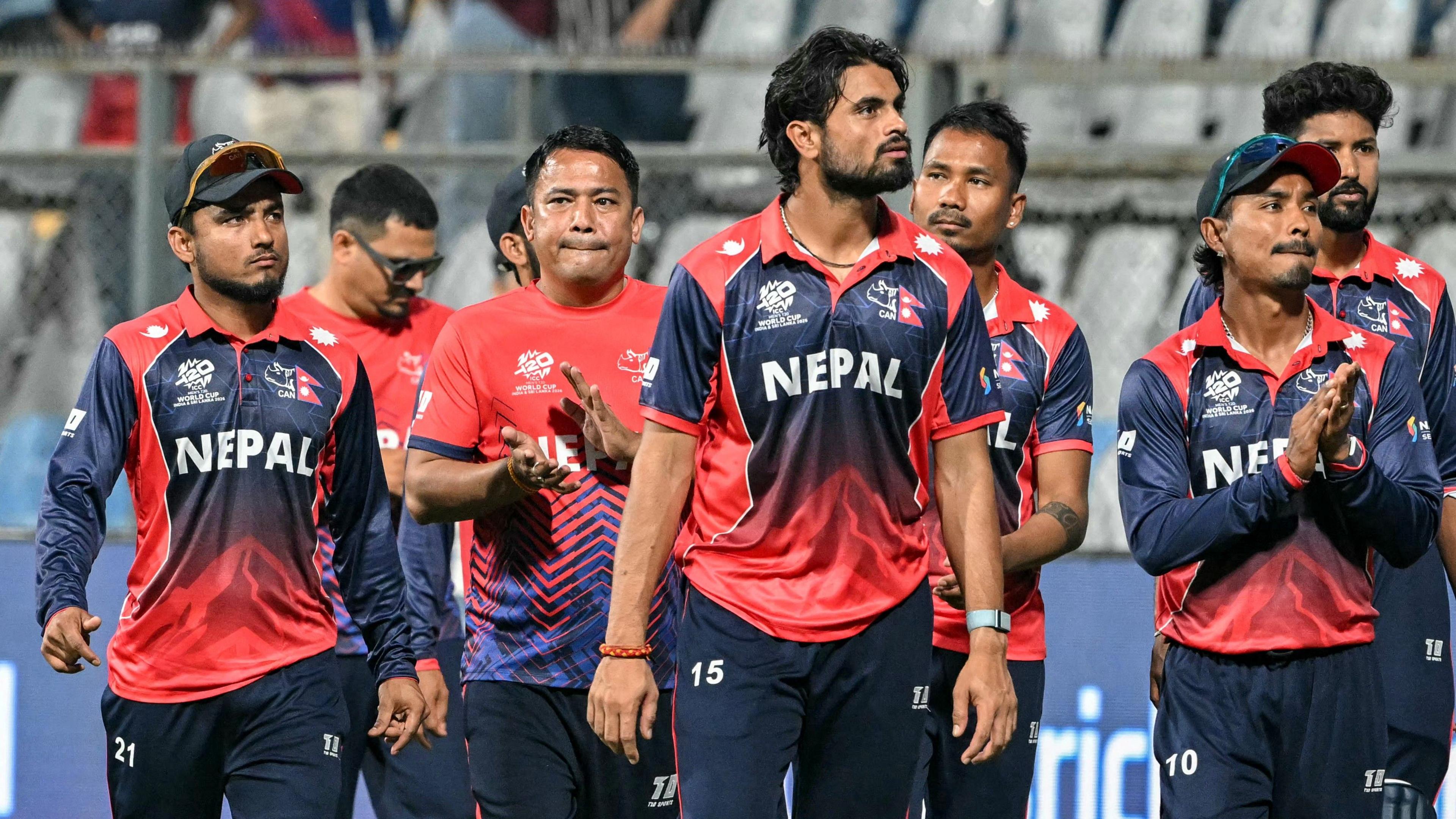 Nepal's players do a lap of honour