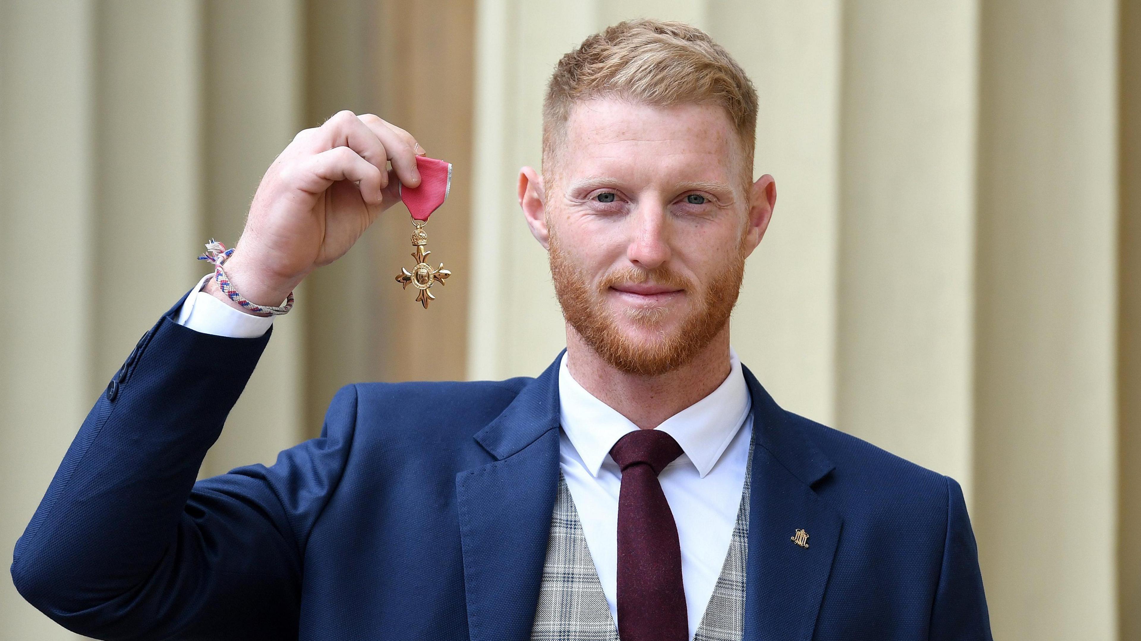 Ben Stokes with OBE medal