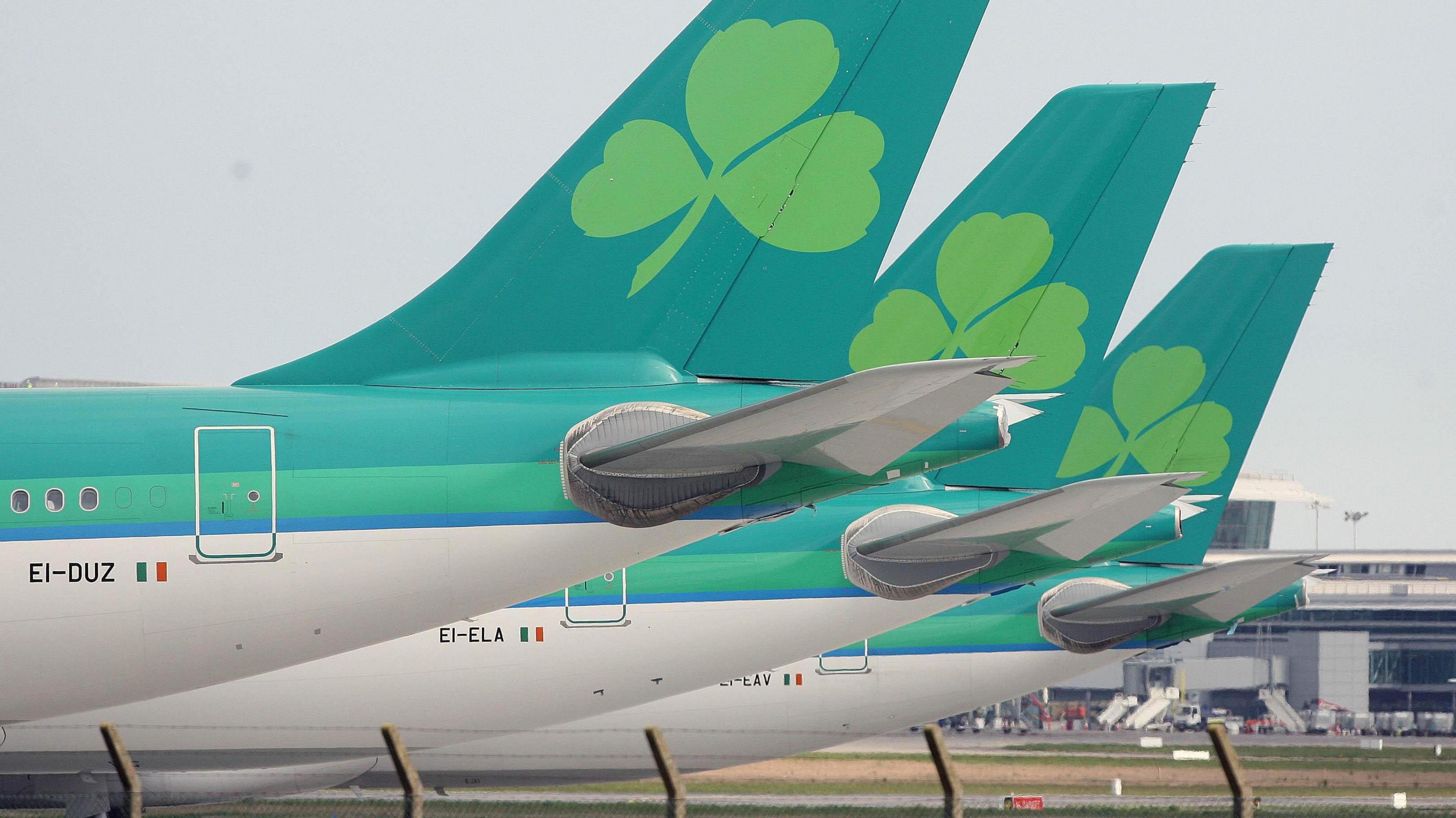 The tails of three Aer Lingus planes