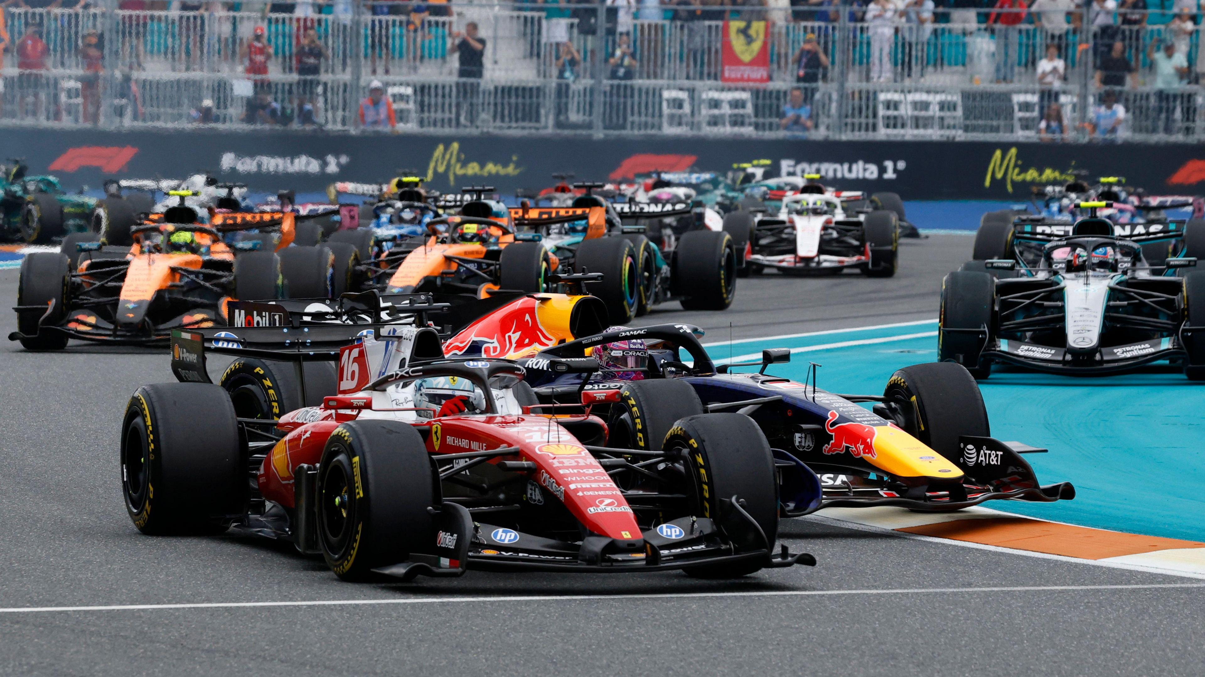 Charles Leclerc leads the Miami Grand Prix through the first corner as Max Verstappen loses control and spins
