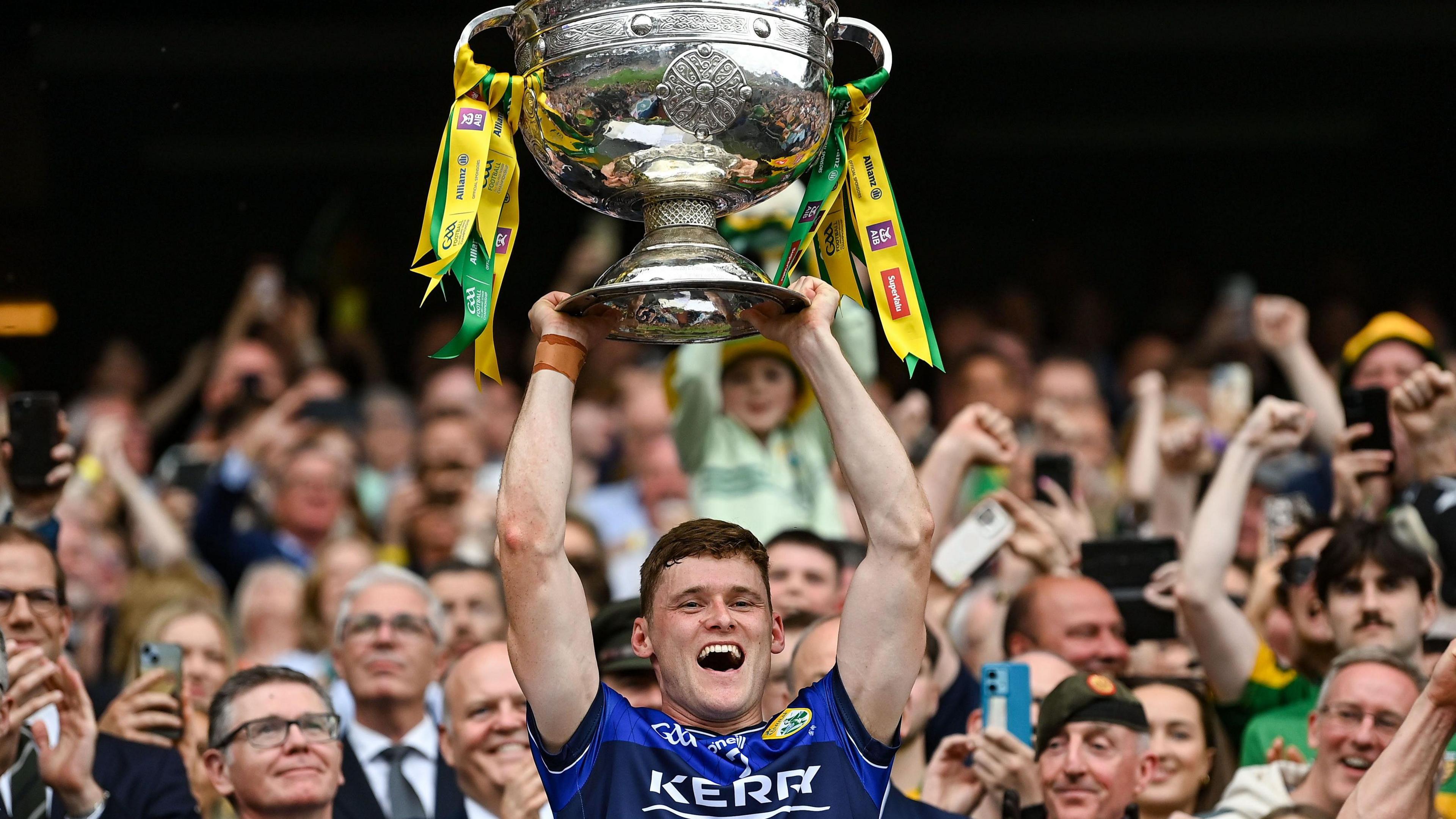 Gavin White lifts the cup