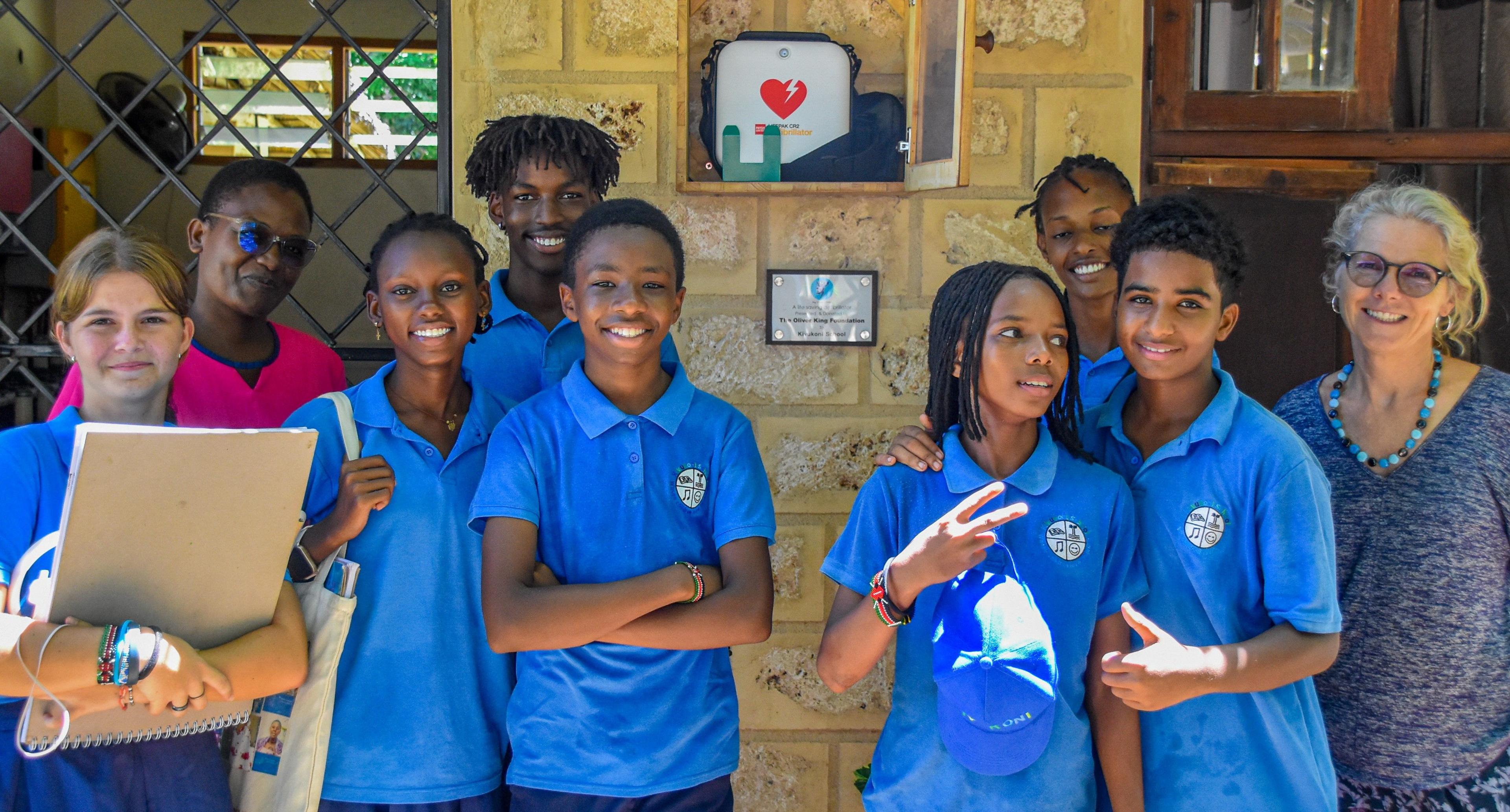 Pupils and staff at the Kivukoni International School