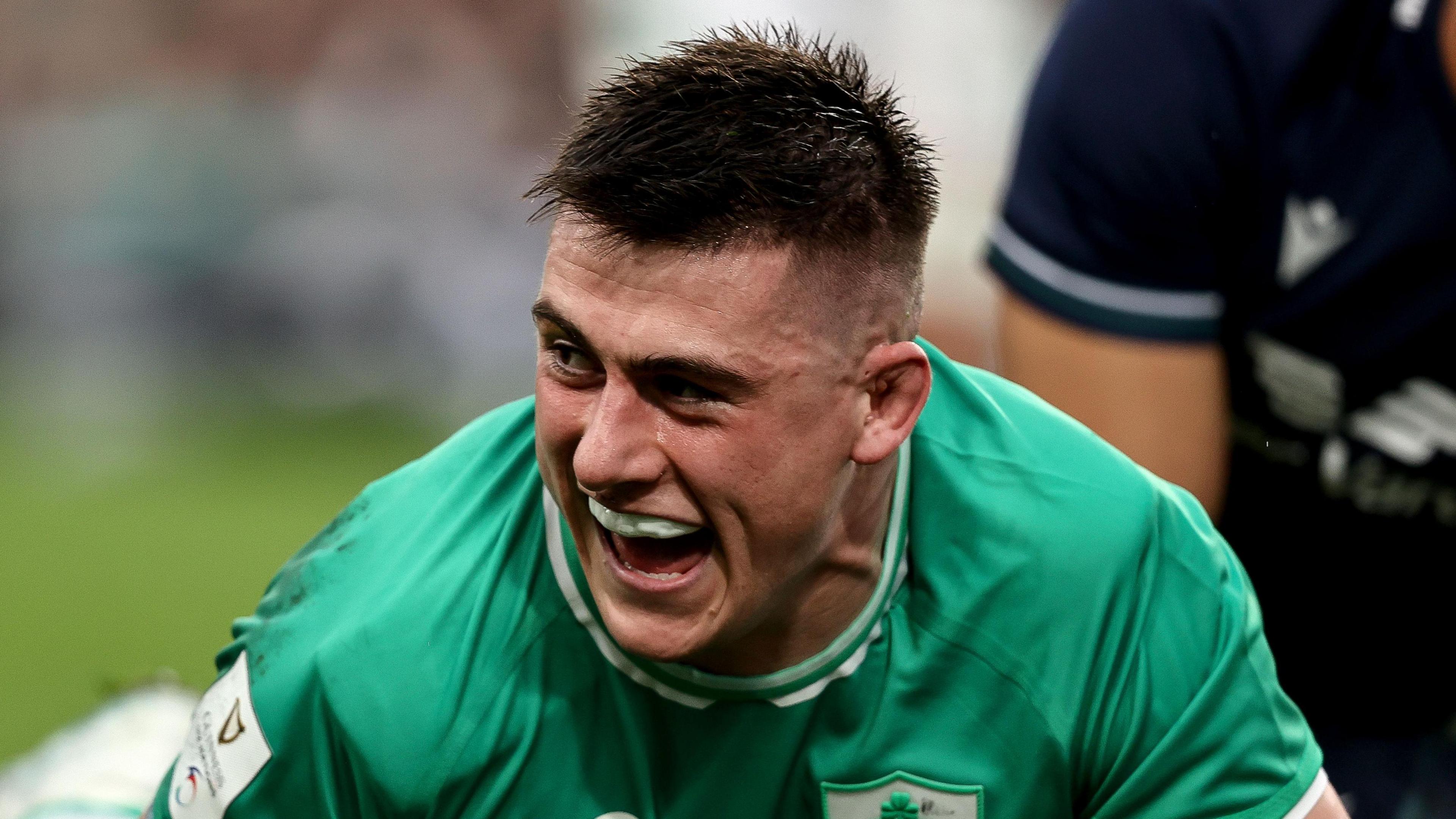 Sheehan scoring a try for Ireland against Scotland