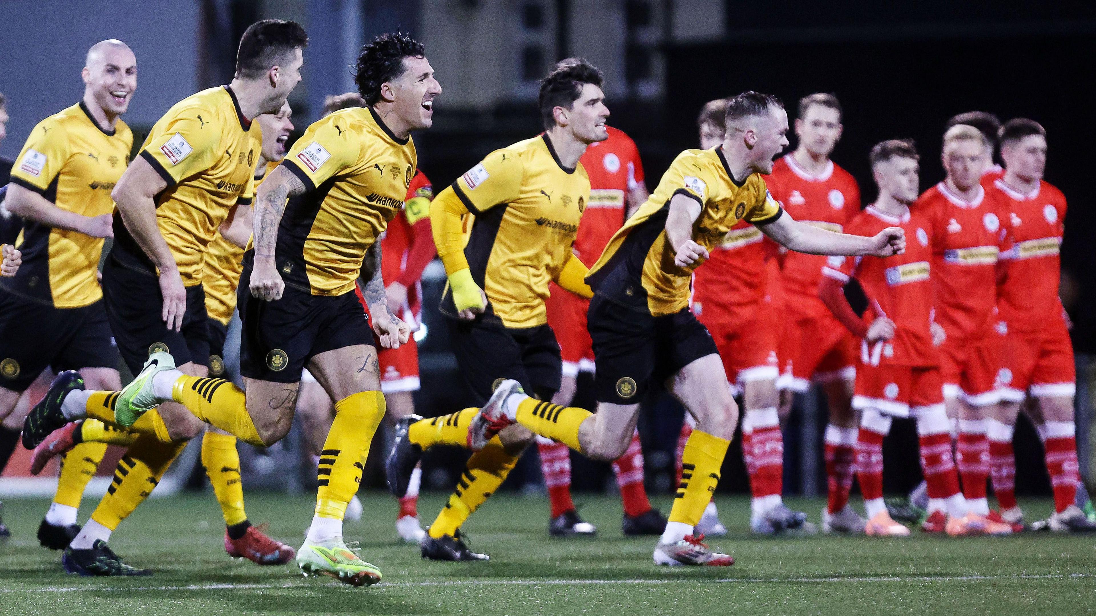 Carrick Rangers celebrate beating Cliftonville to win the County Antrim Shield