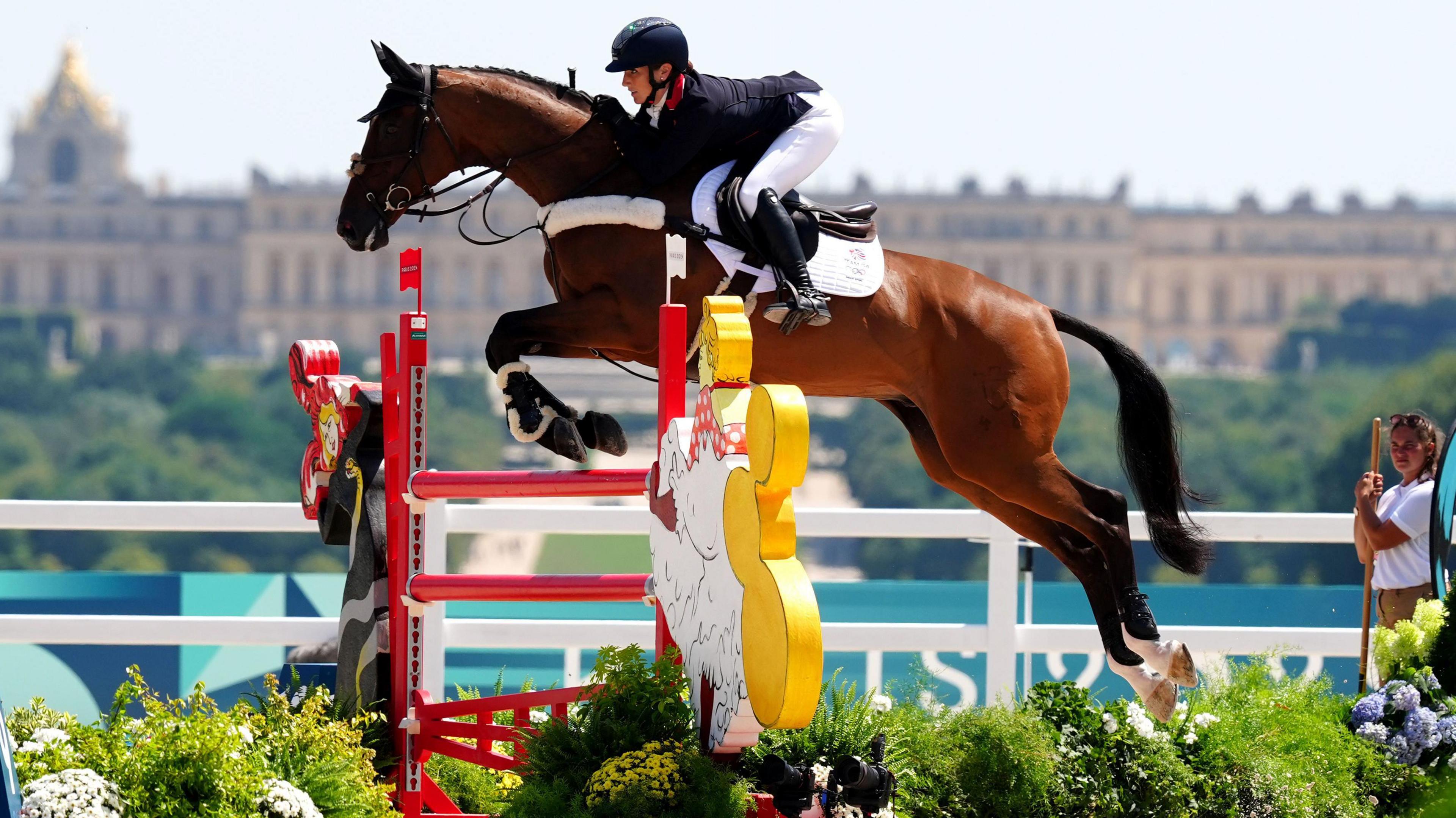 reat Britain's Laura Collett aboard London 52 celebrates during the Eventing Team Jumping Final on their way to winning a gold medal at the Château de Versailles on the third day of the 2024 Paris Olympic Games in France. 