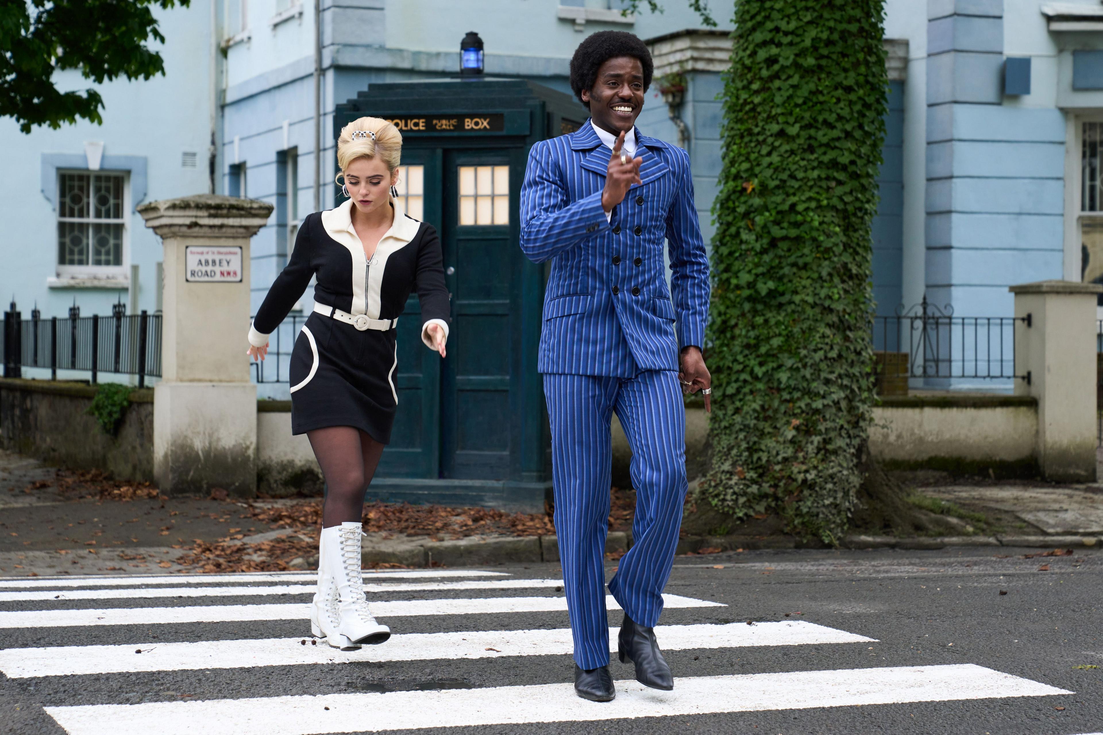 Ruby and The Doctor on the Abbey Road zebra crossing, with the TARDIS behind them