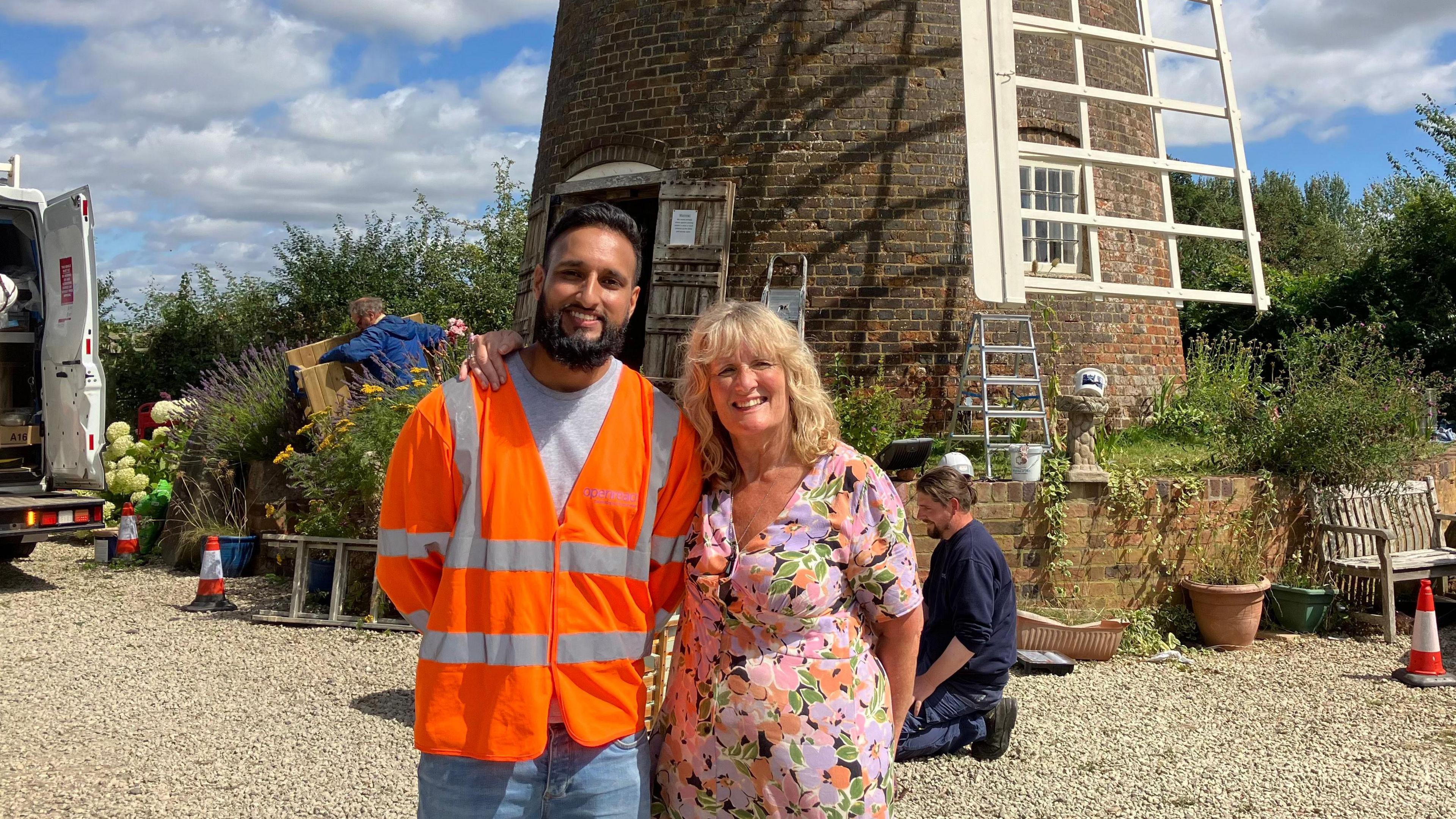 Volunteer Muhammud Aaidun and Windmill guardian Jeanette McGarry