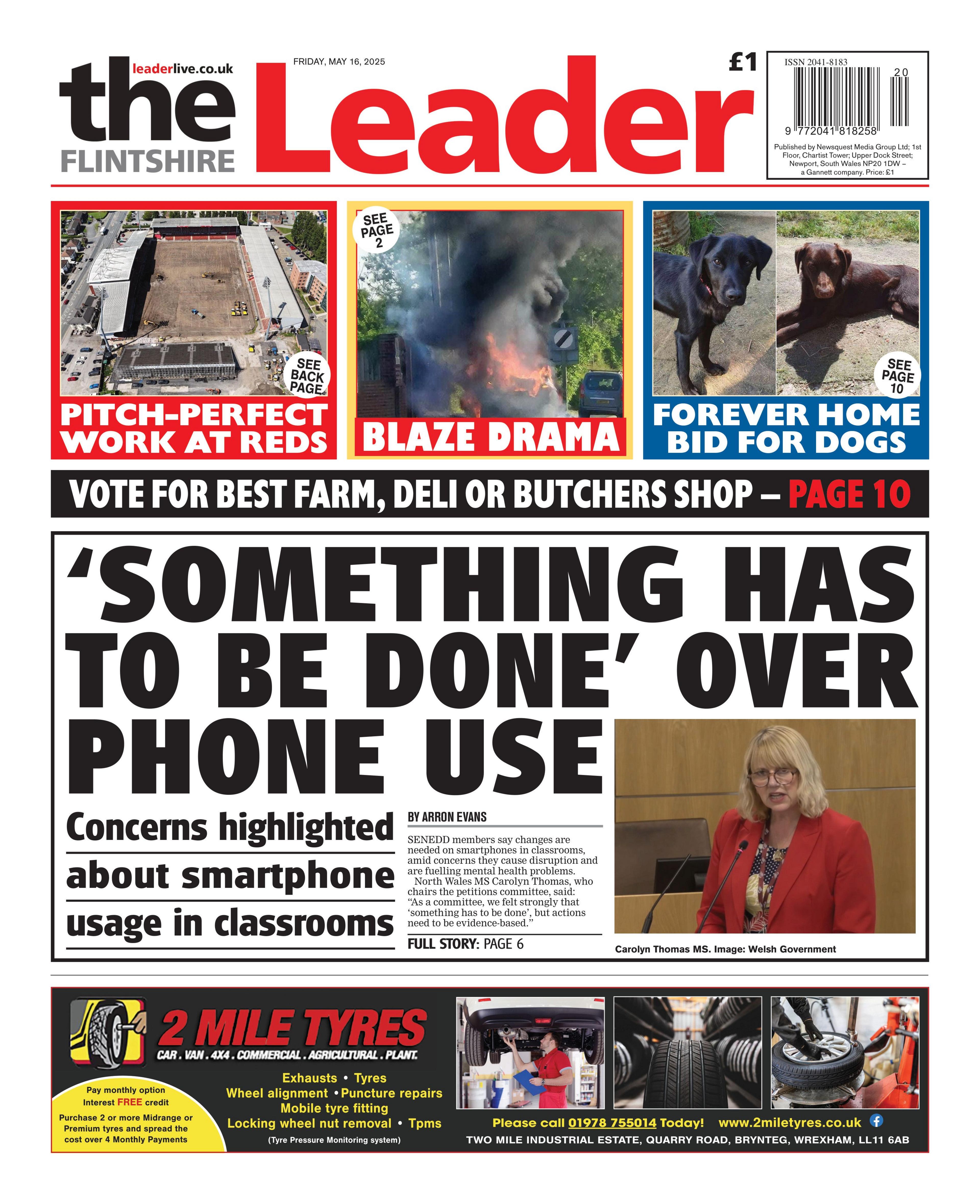 The Flintshire Leader front page. Three stories at the top are in different coloured boxes. In the red box: pitch-perfect work at red with a picture of a stadium. Next yellow box says Blaze drama with photo of a big fire billowing black smoke. Blue box says Forever home bid for dogs, black and brown labradors. There is a black box beneath the boxes that says Vote for best farm, deli or butchers shop. Below is a black lined box that says: 'Something has to be done' over phone use - Concerns highlighted about smartphone usage in classrooms. 